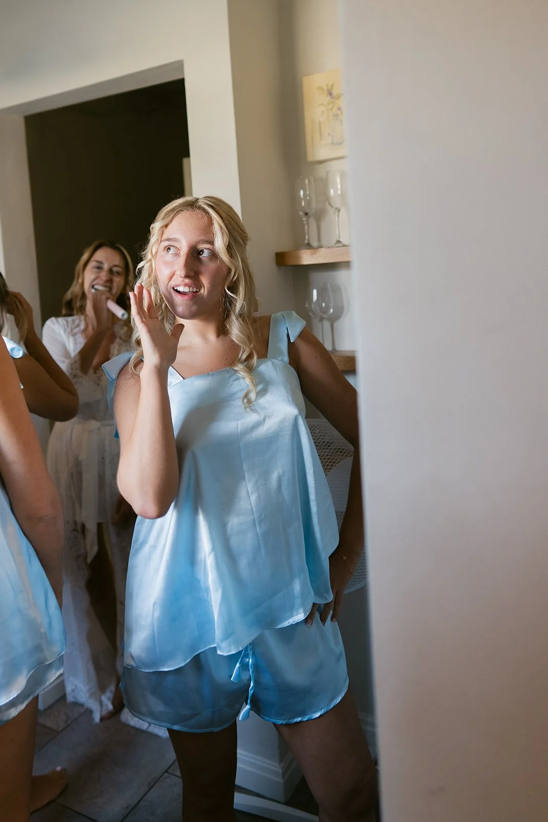 bridesmaid-blue-satin-pyjamas-wedding-morning.jpg