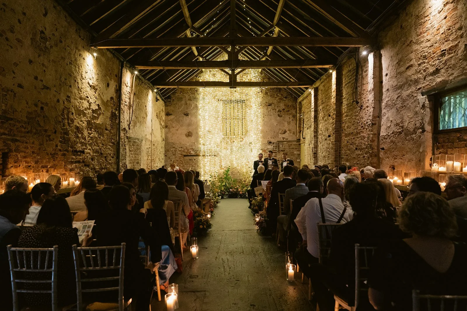 candlelit-wedding-ceremony-old-barn-the-normans.jpg