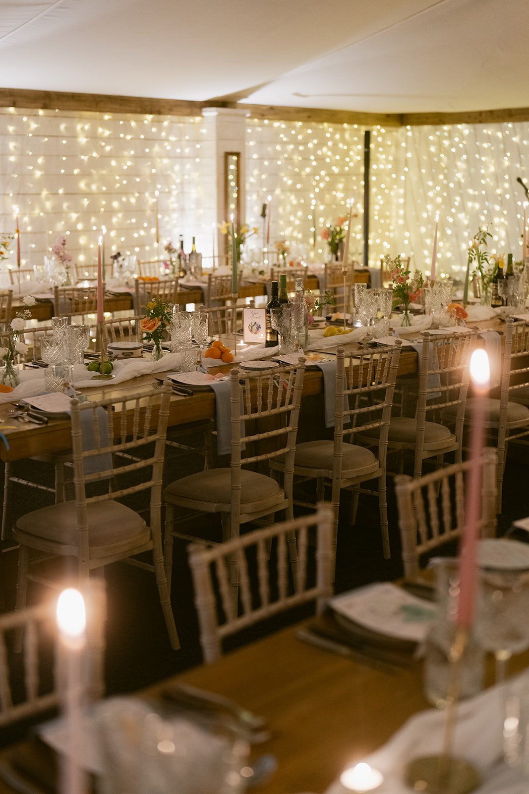 candlelit-marquee-tables-fairy-light-walls.jpg