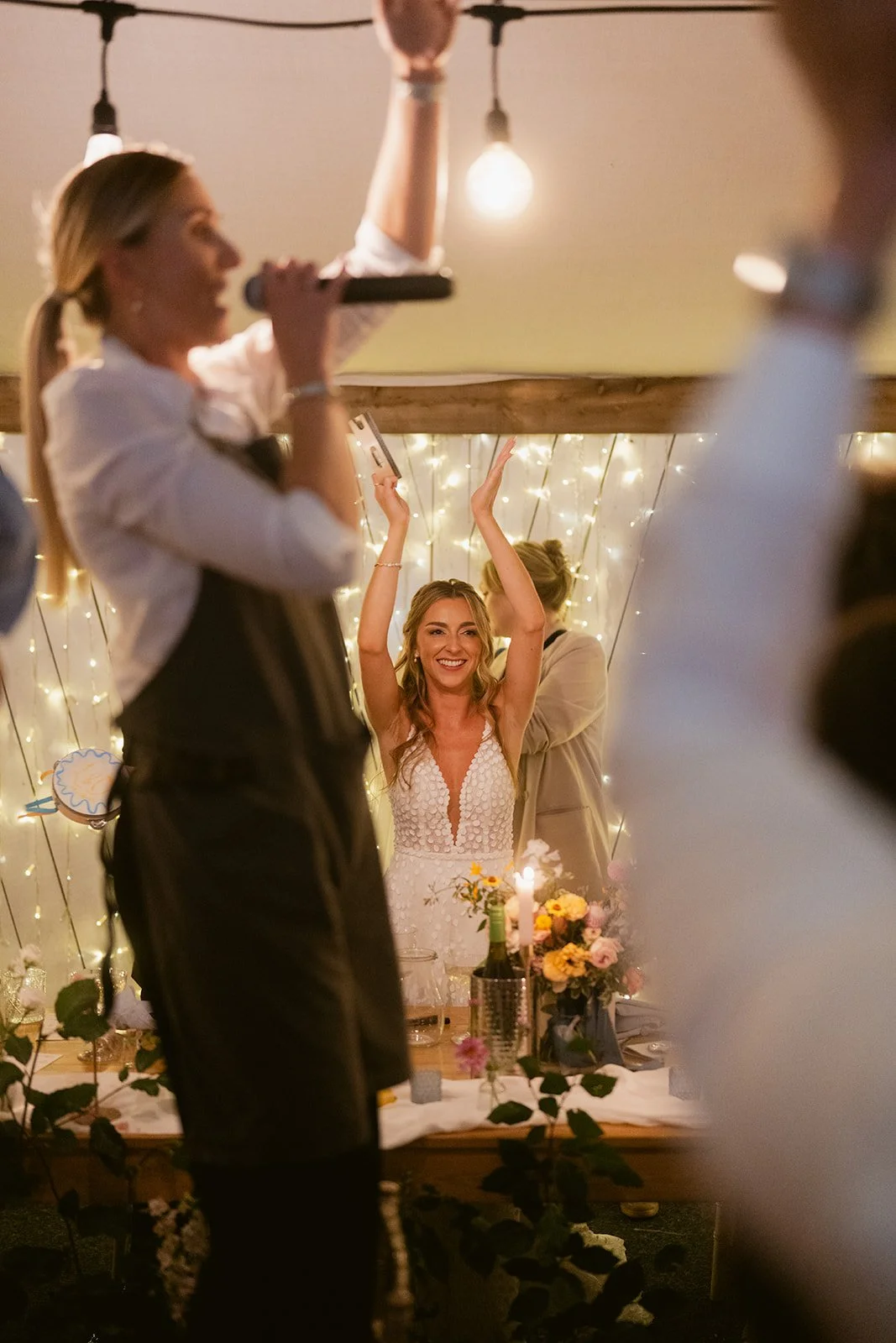 bride-tambourine-singing-waiters-performance.jpg