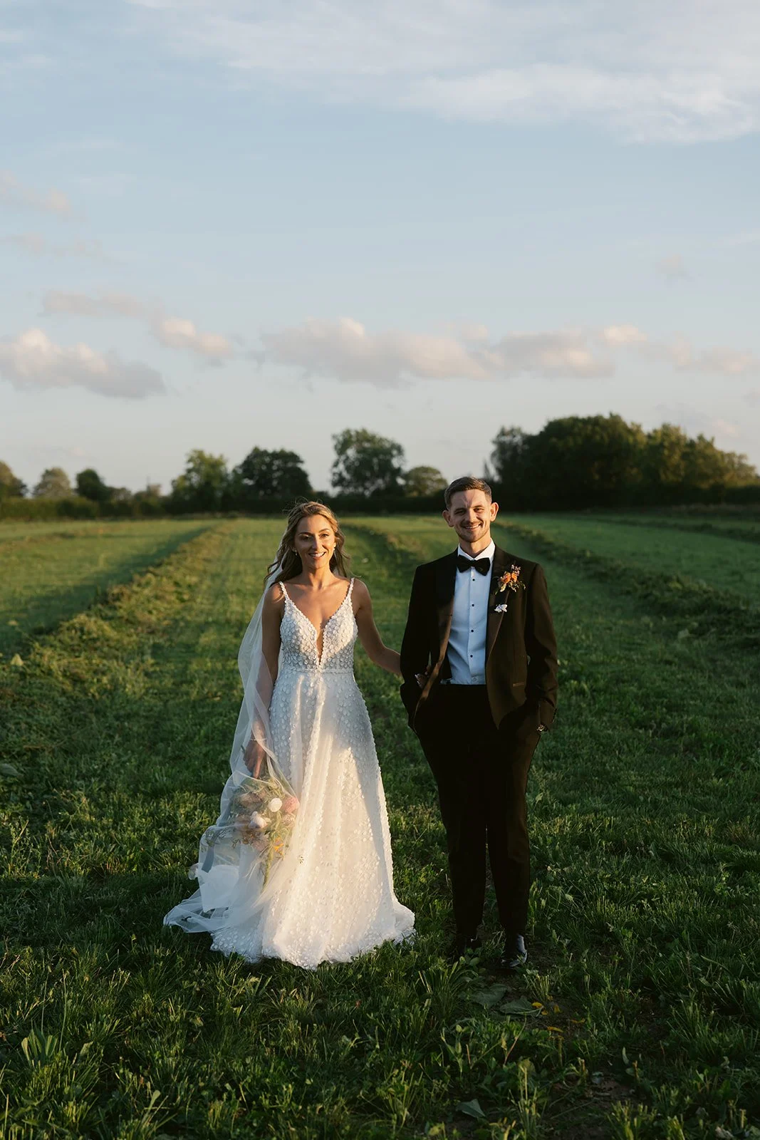 bride-groom-portrait-farm-fields-sunset.jpg