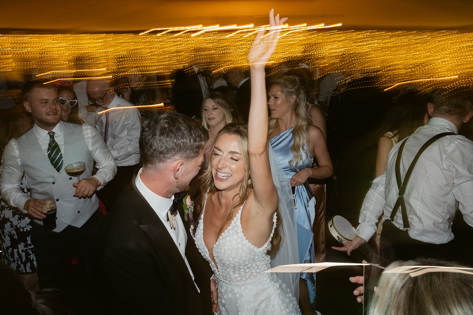 bride-groom-dance-floor-fairy-light-blur.jpg