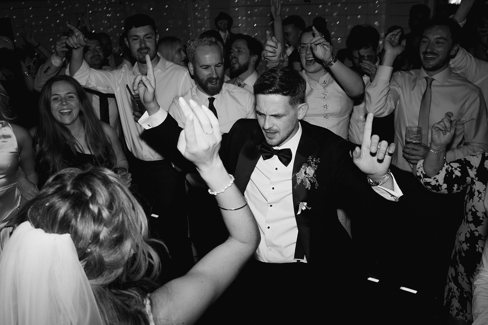 groom-dancing-packed-dance-floor.jpg