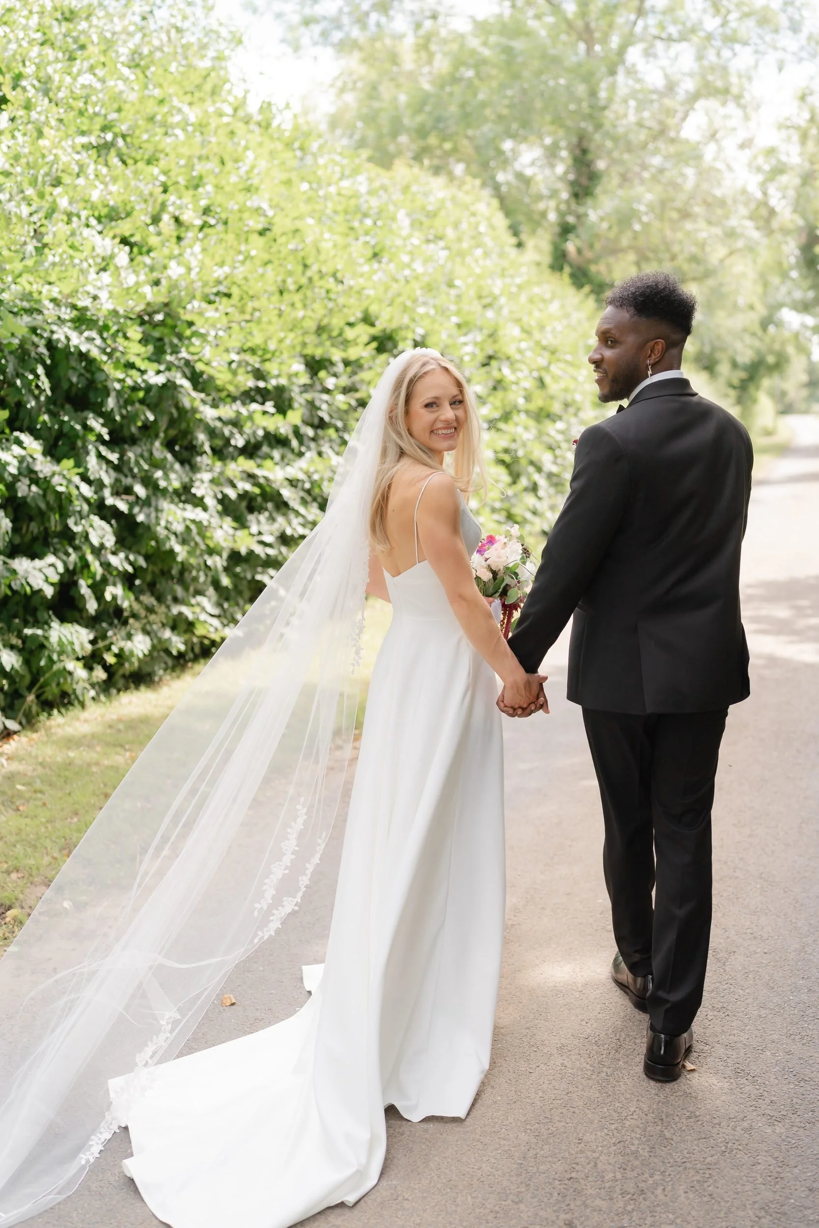 the-normans-bride-groom-country-lane-portrait-looking-back-535.jpg