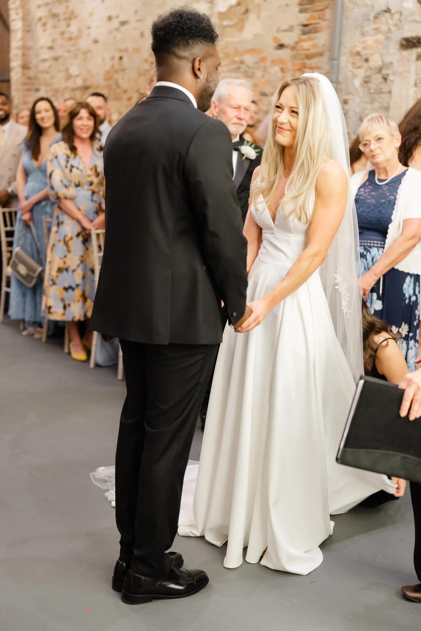 the-normans-bride-groom-holding-hands-start-of-ceremony-306.jpg