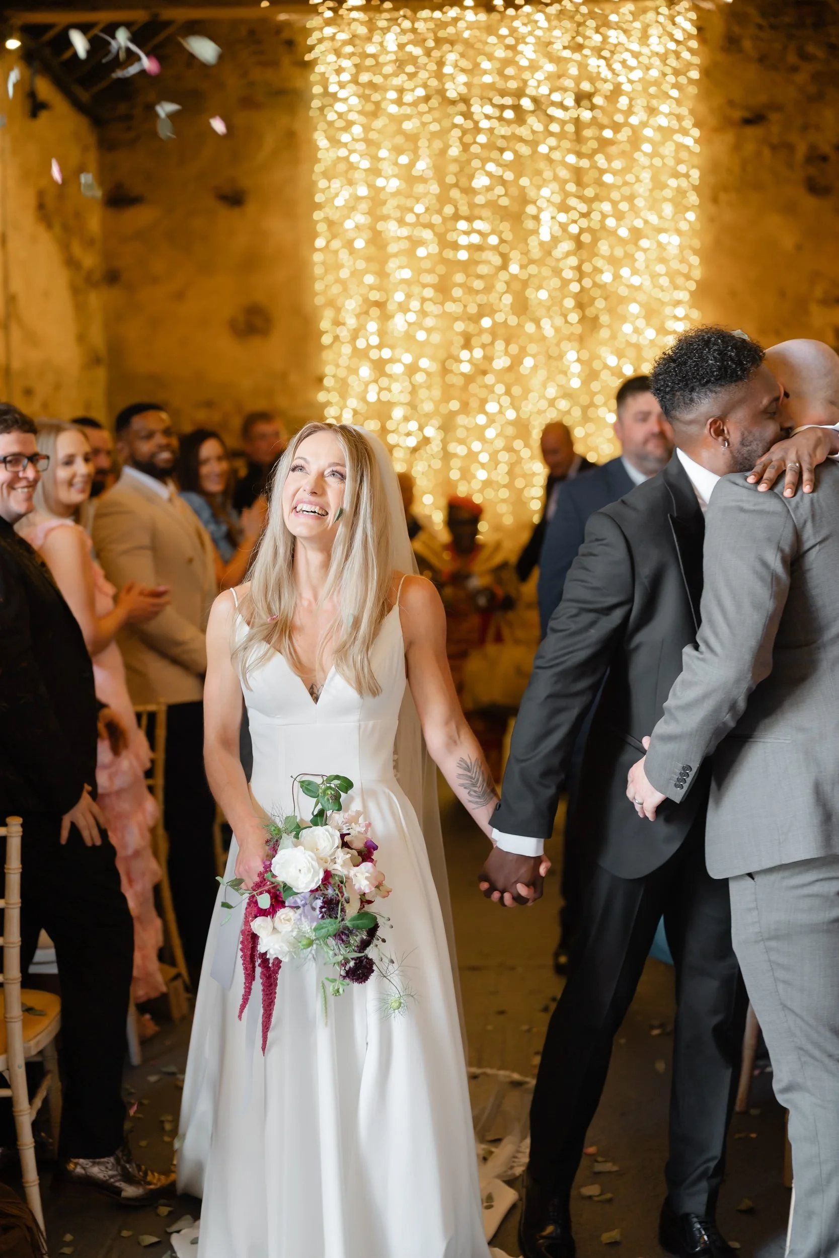 the-normans-bride-laughing-confetti-aisle-barn-wedding-392.jpg
