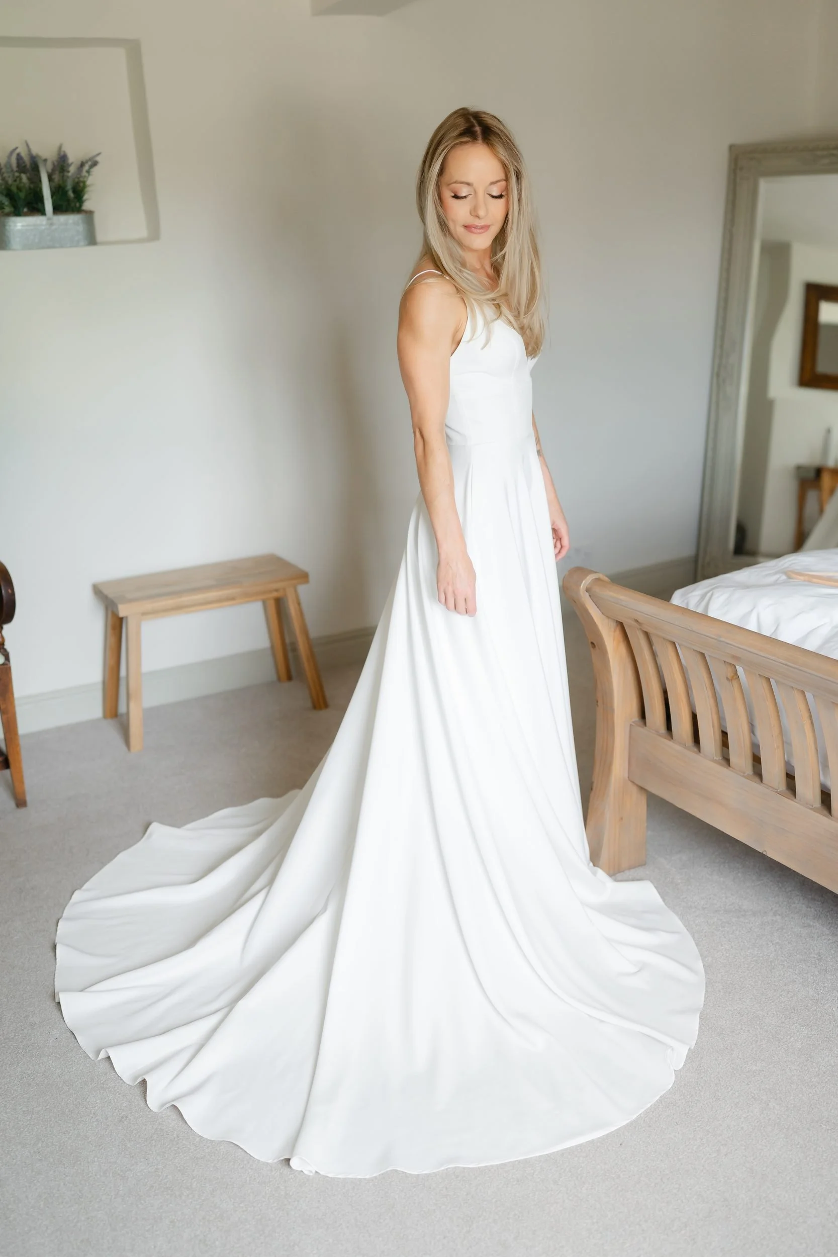 the-normans-bride-satin-gown-train-bridal-suite-york-venue-150.jpg