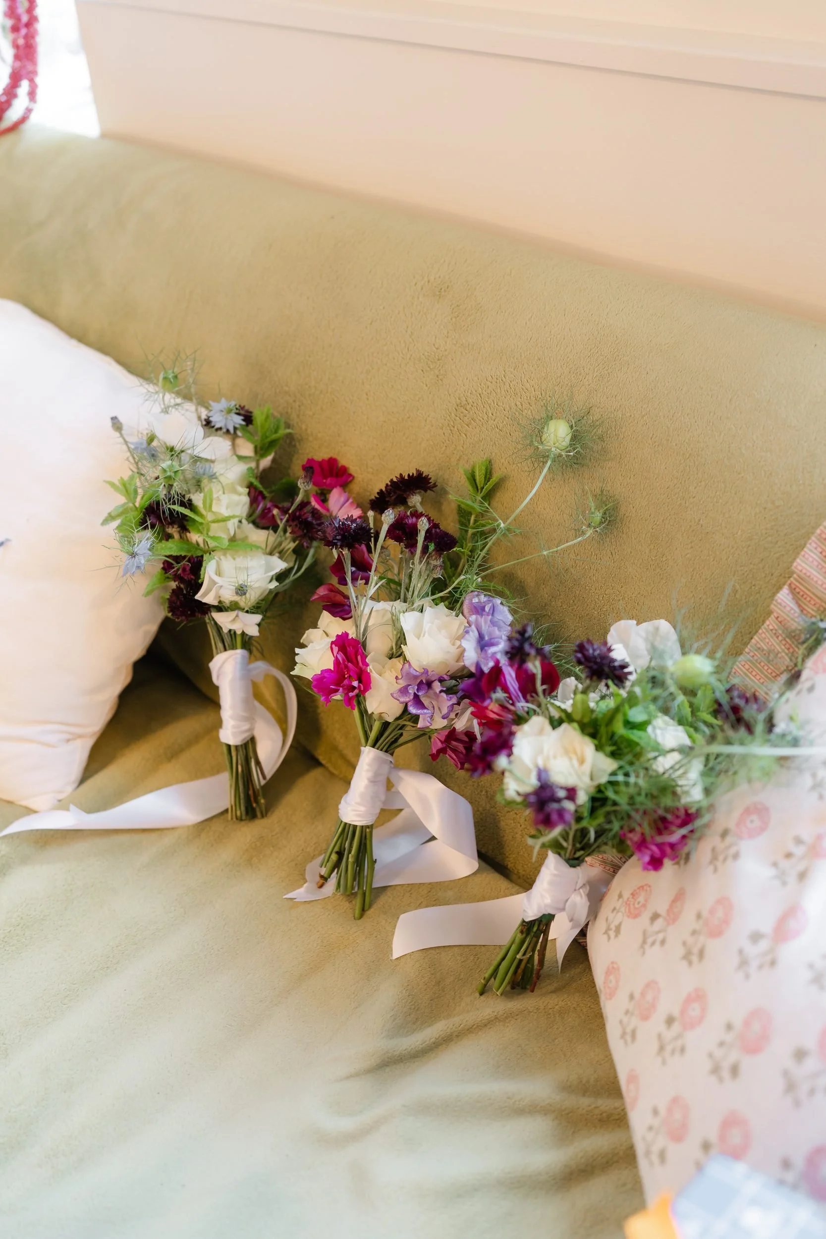 the-normans-bridesmaid-bouquets-sweet-peas-ribbon-sofa-103.jpg