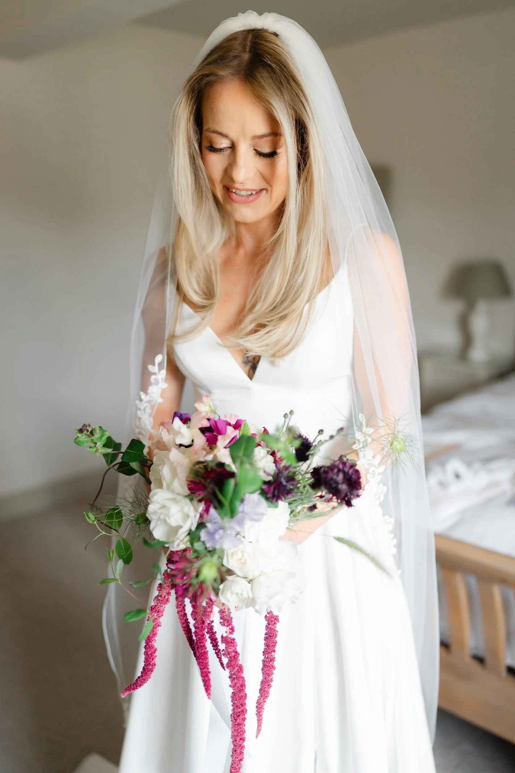 the-normans-bride-with-bouquet-veil-bridal-suite-178.jpg