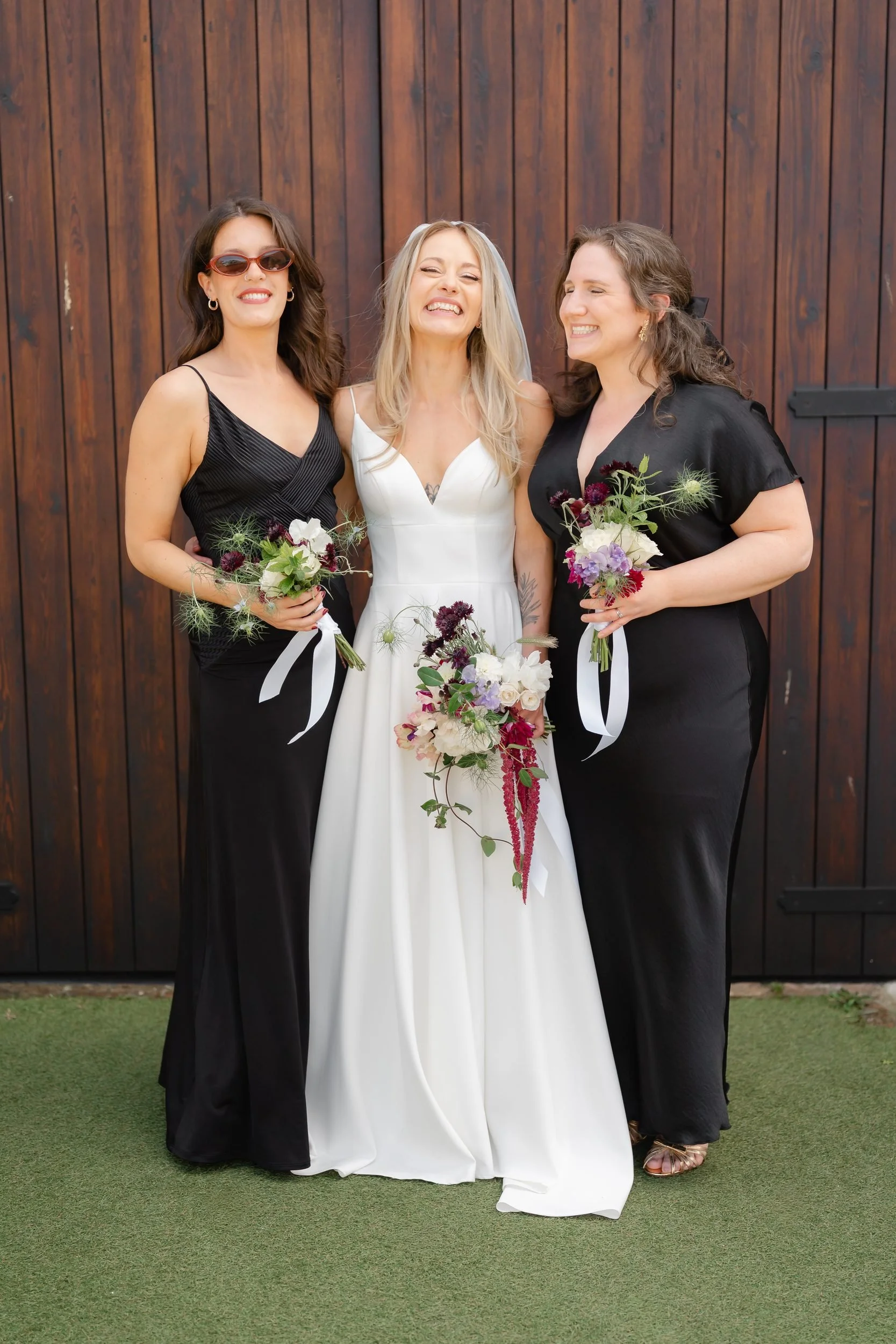 the-normans-bride-with-bridesmaids-timber-doors-bouquets-502.jpg
