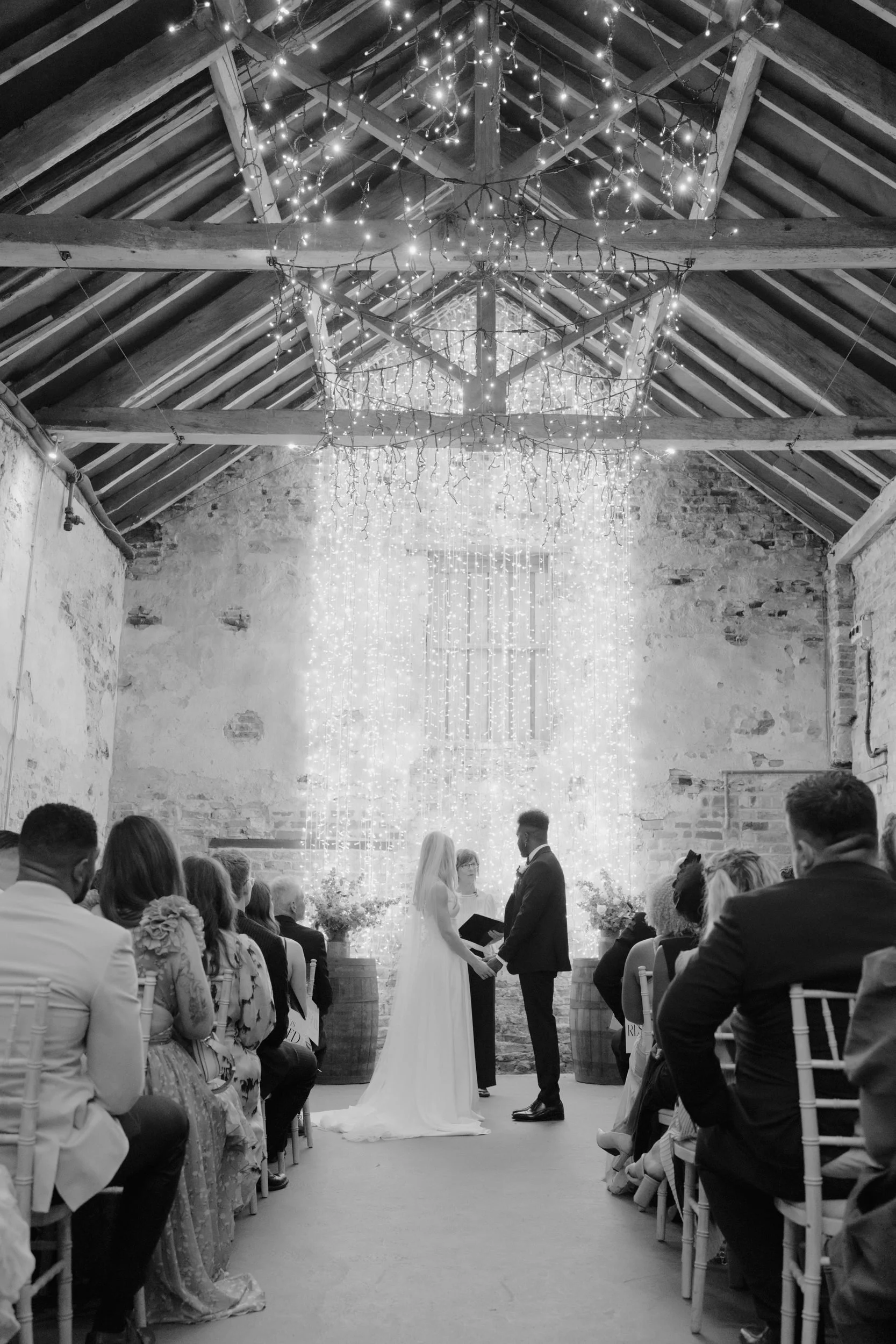 the-normans-ceremony-barn-wide-fairy-lights-black-and-white-315.jpg