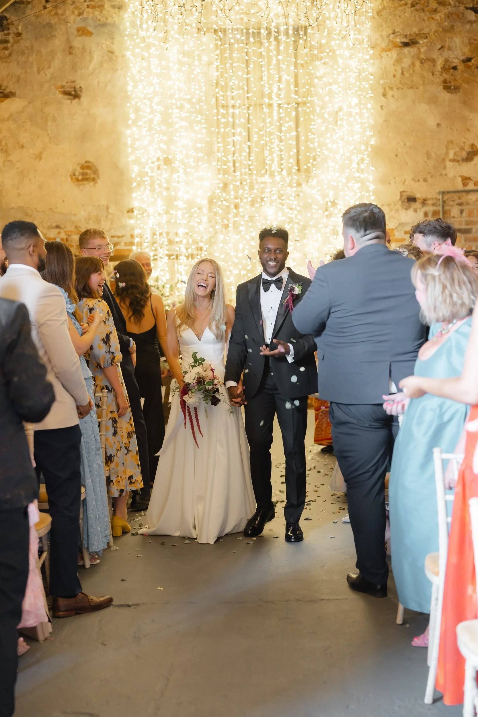 the-normans-newlyweds-confetti-aisle-fairy-lights-barn-york-383.jpg