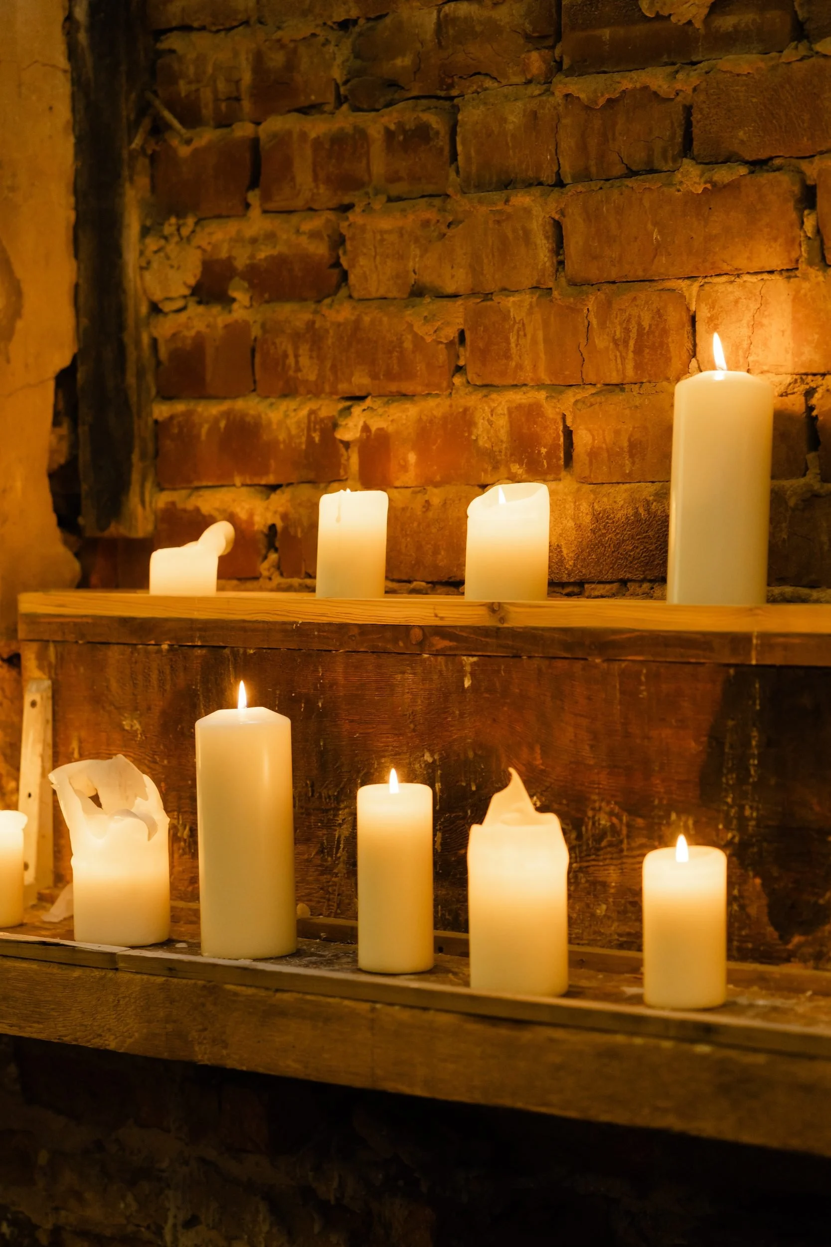the-normans-pillar-candles-exposed-brick-ceremony-barn-253.jpg