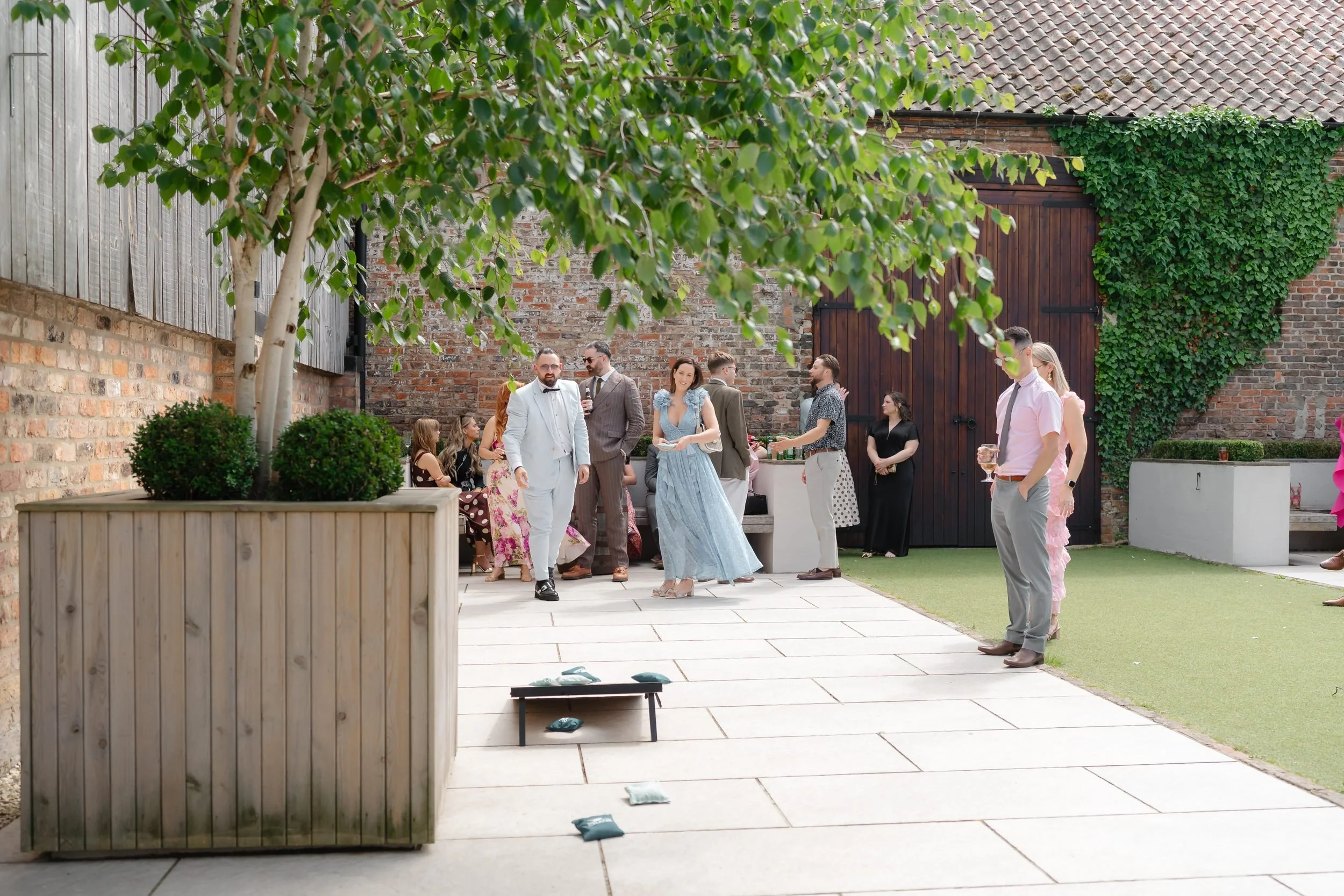 the-normans-cornhole-garden-games-courtyard-drinks-reception-693.jpg
