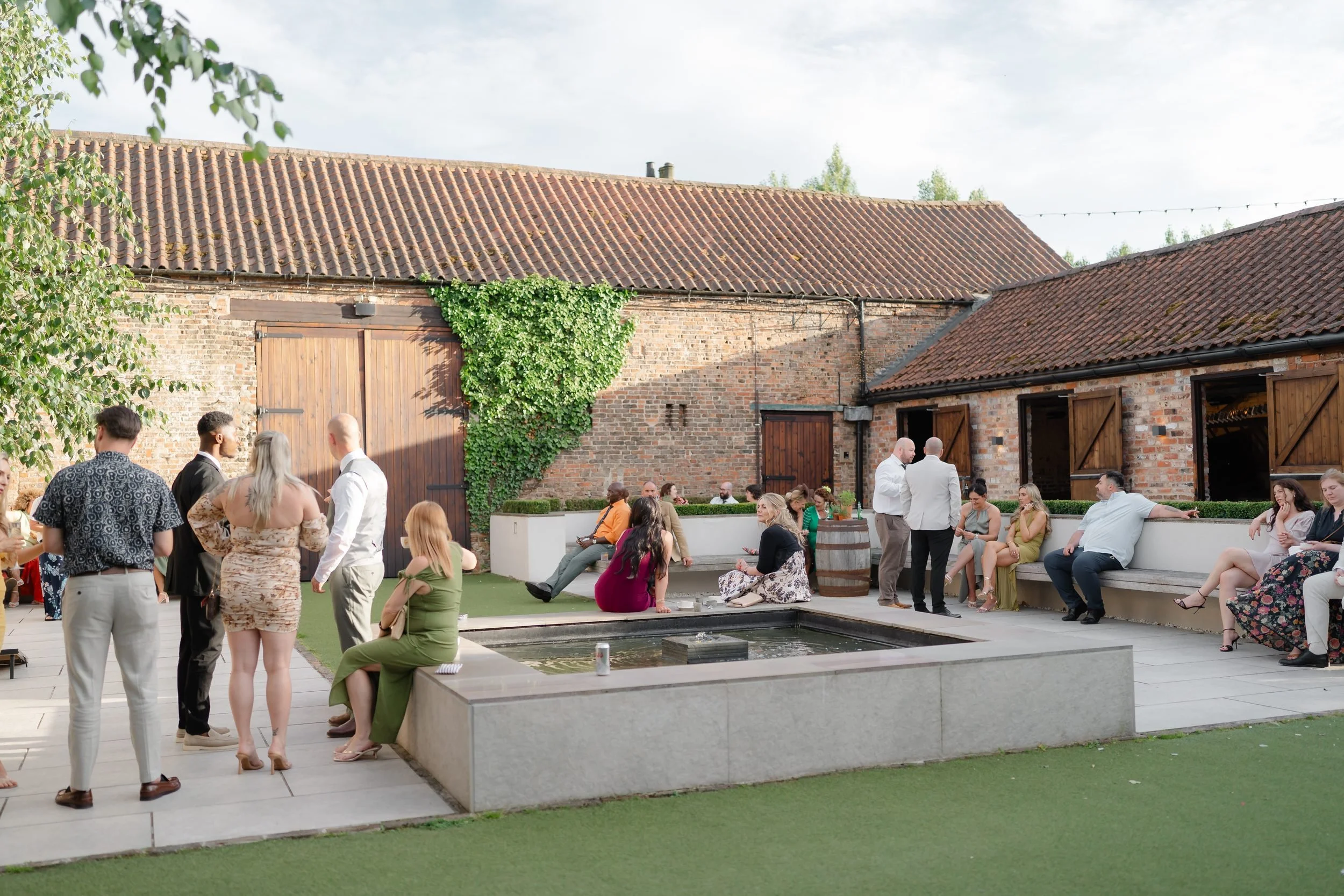 the-normans-courtyard-water-feature-drinks-reception-evening-997.jpg