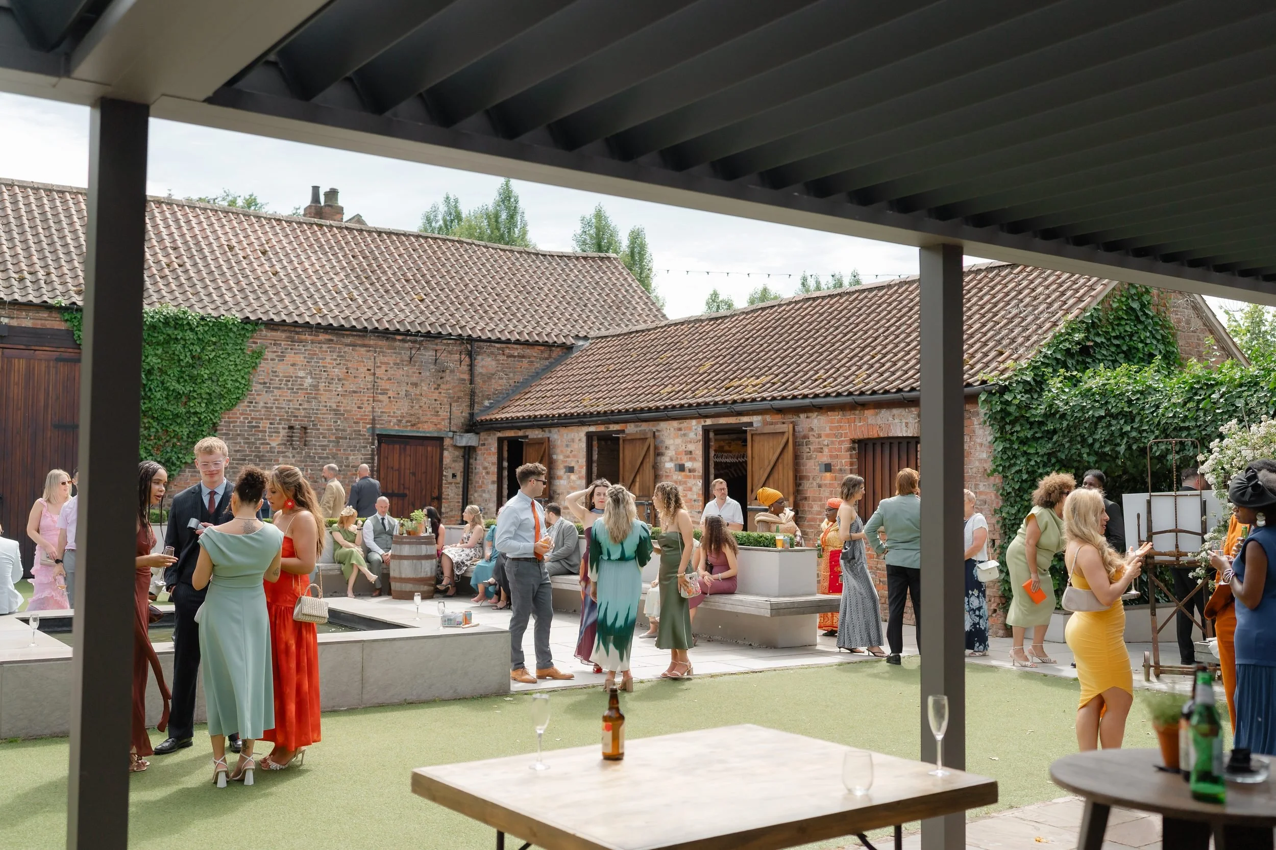 the-normans-drinks-reception-pergola-courtyard-bilbrough-701.jpg