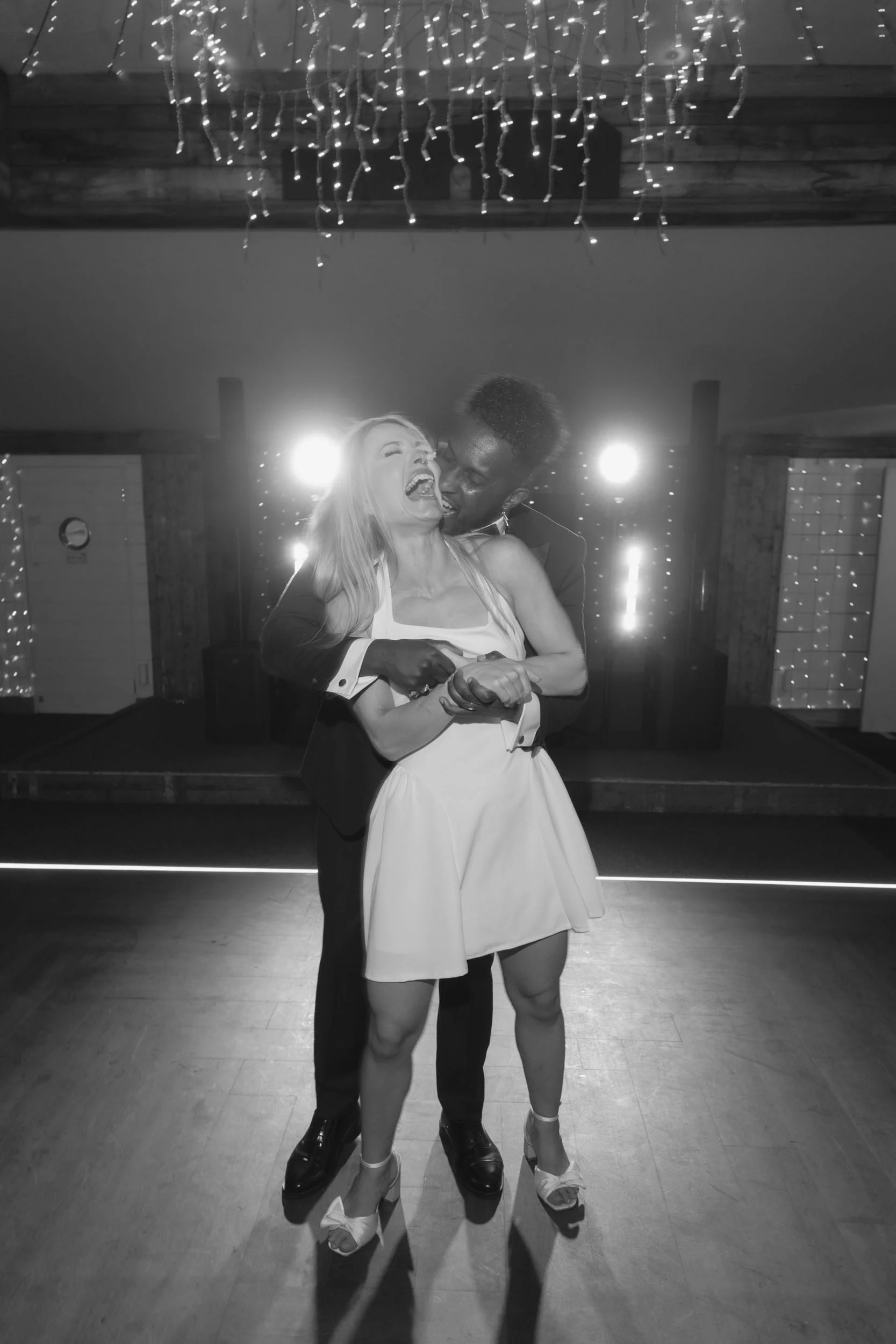 the-normans-first-dance-black-and-white-dance-floor-fairy-lights-1021.jpg