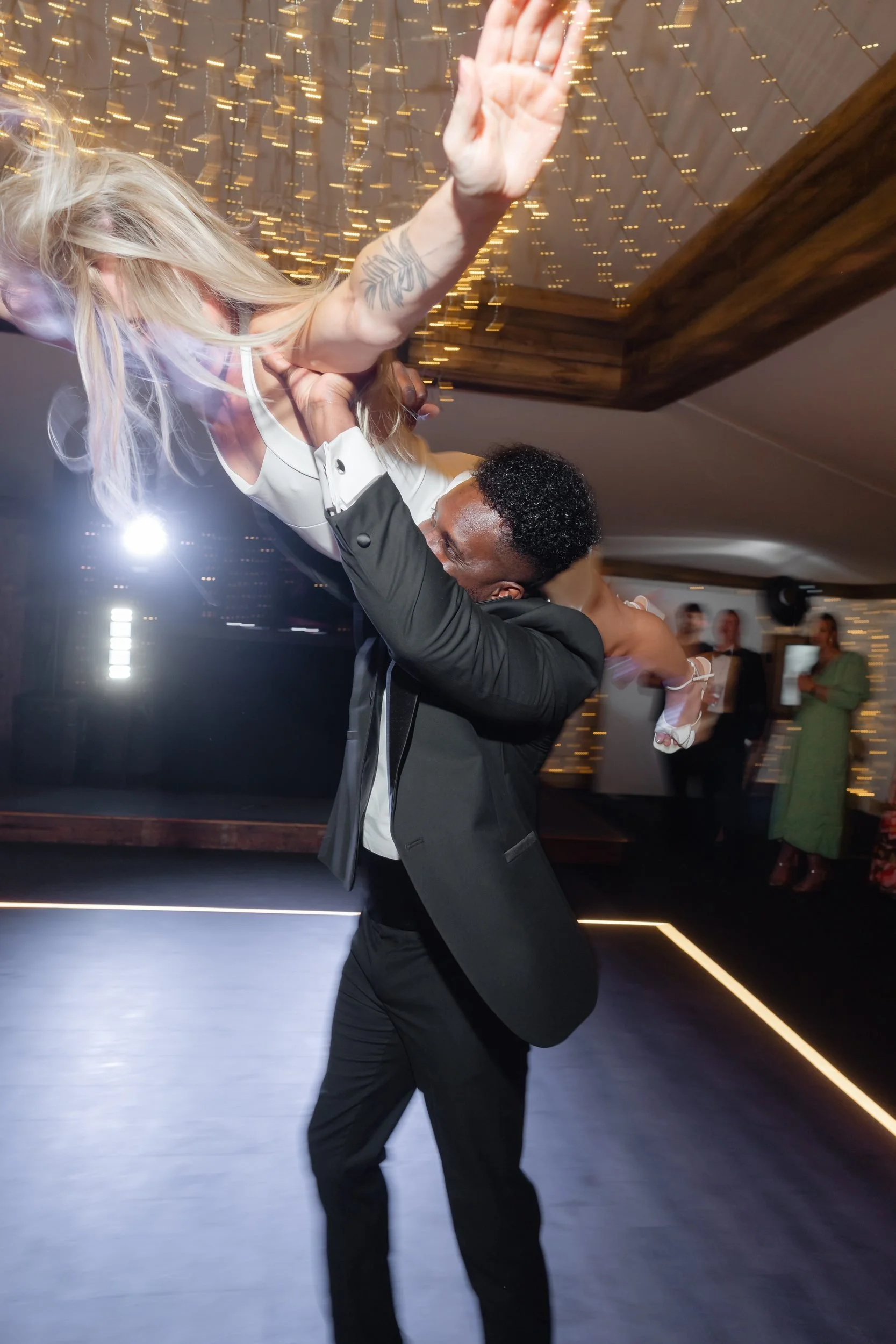 the-normans-first-dance-lift-fairy-light-ceiling-reception-york-1027.jpg
