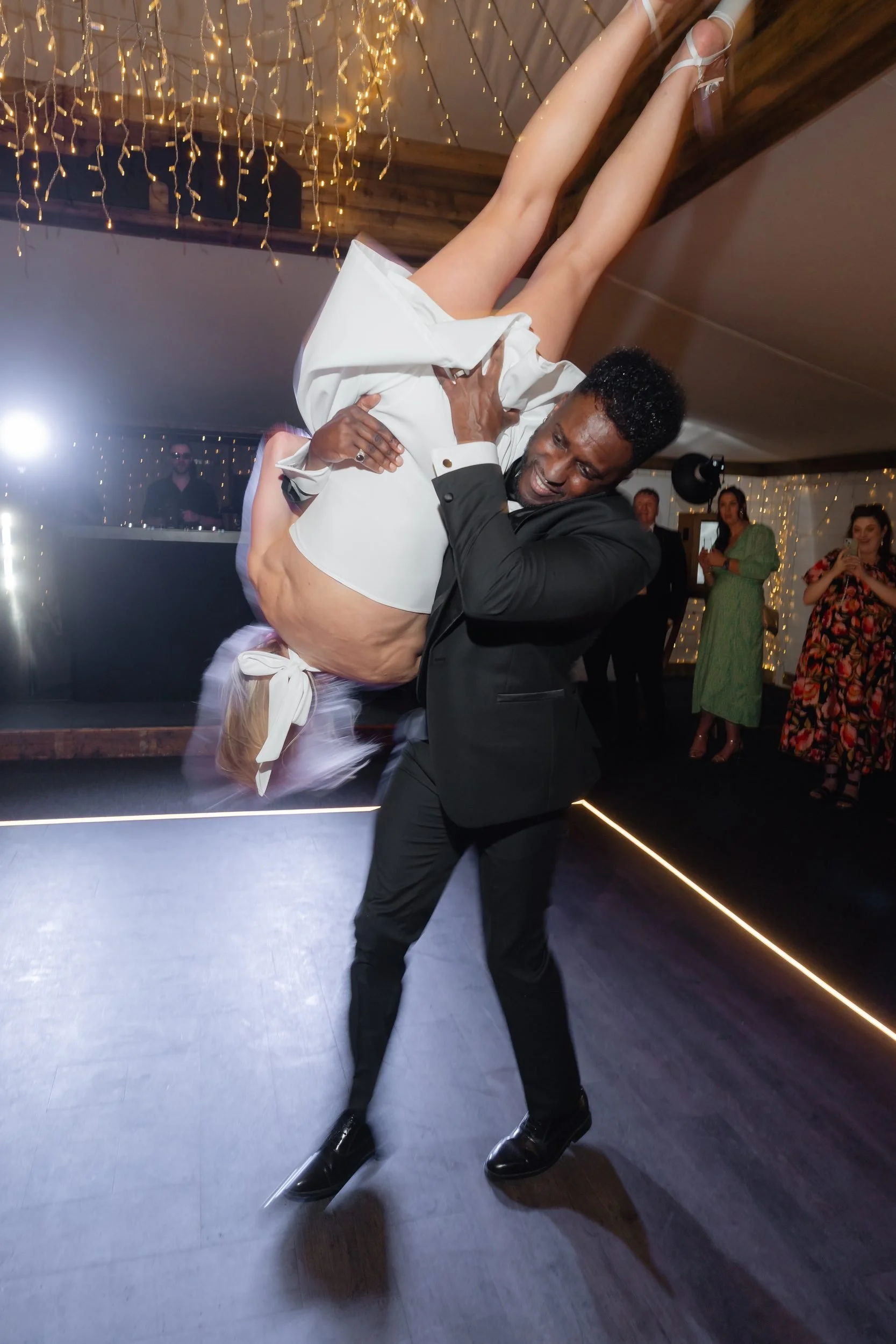 the-normans-groom-lifting-bride-first-dance-dance-floor-1026.jpg