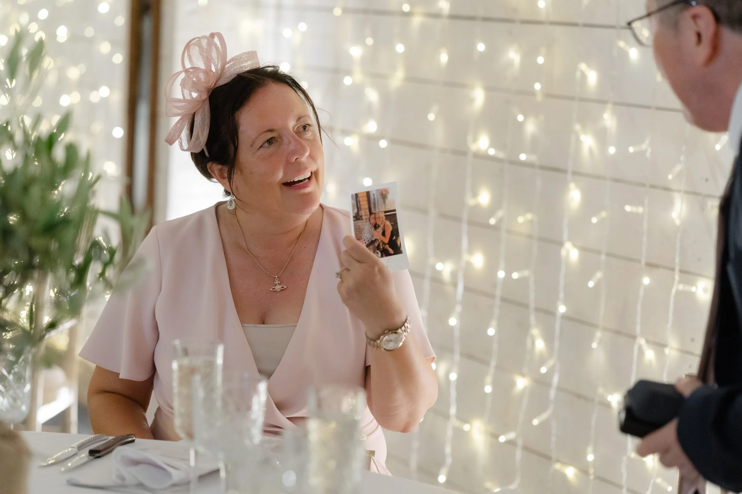 the-normans-guest-fascinator-polaroid-fairy-light-wall-reception-723.jpg