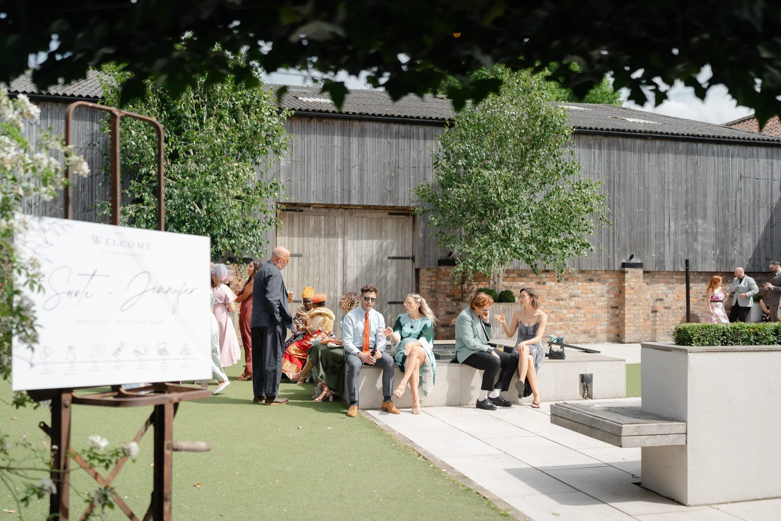 the-normans-welcome-sign-drinks-reception-courtyard-lawn-658.jpg