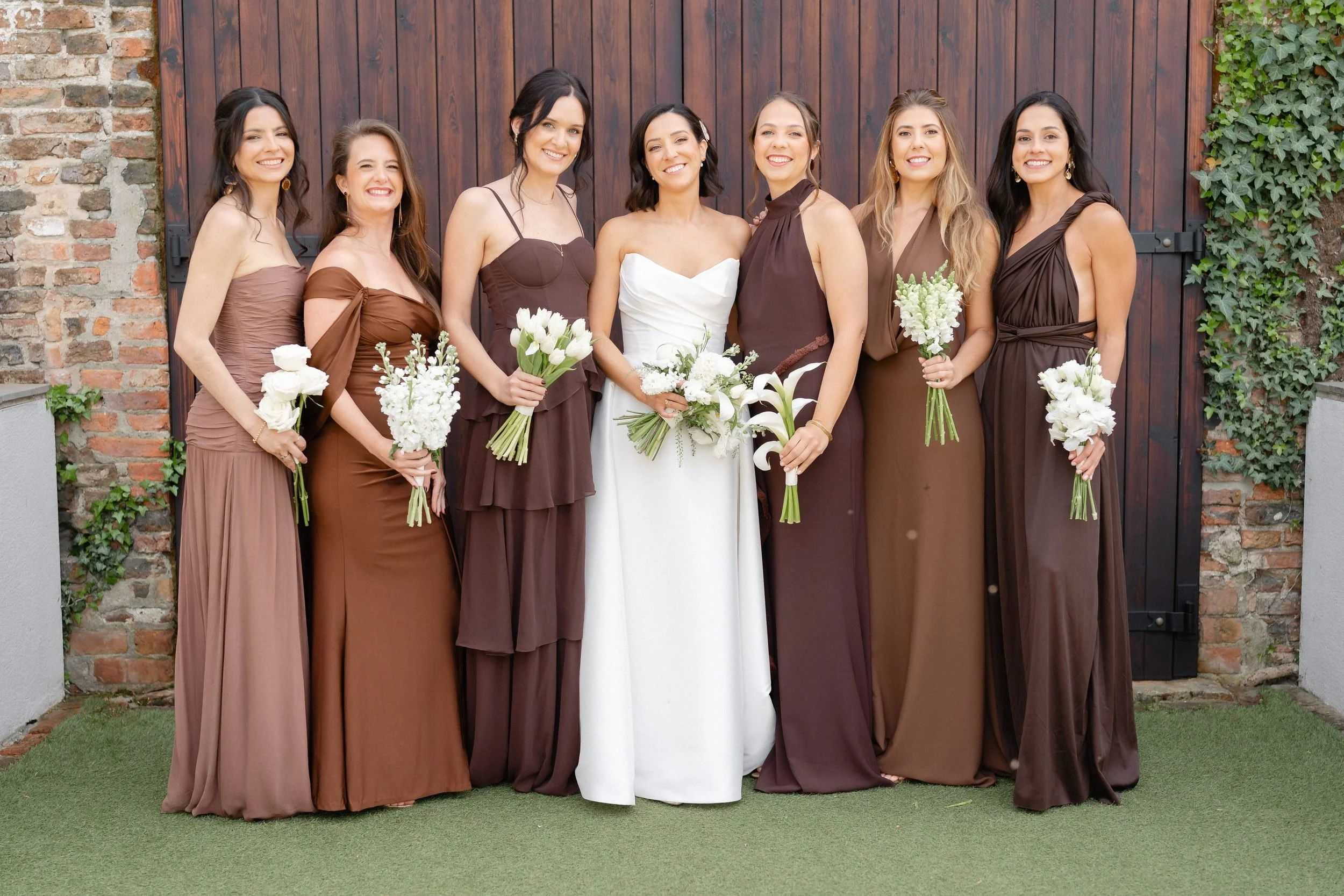 bride-and-bridesmaids-brown-dresses-barn-doors-469.jpg