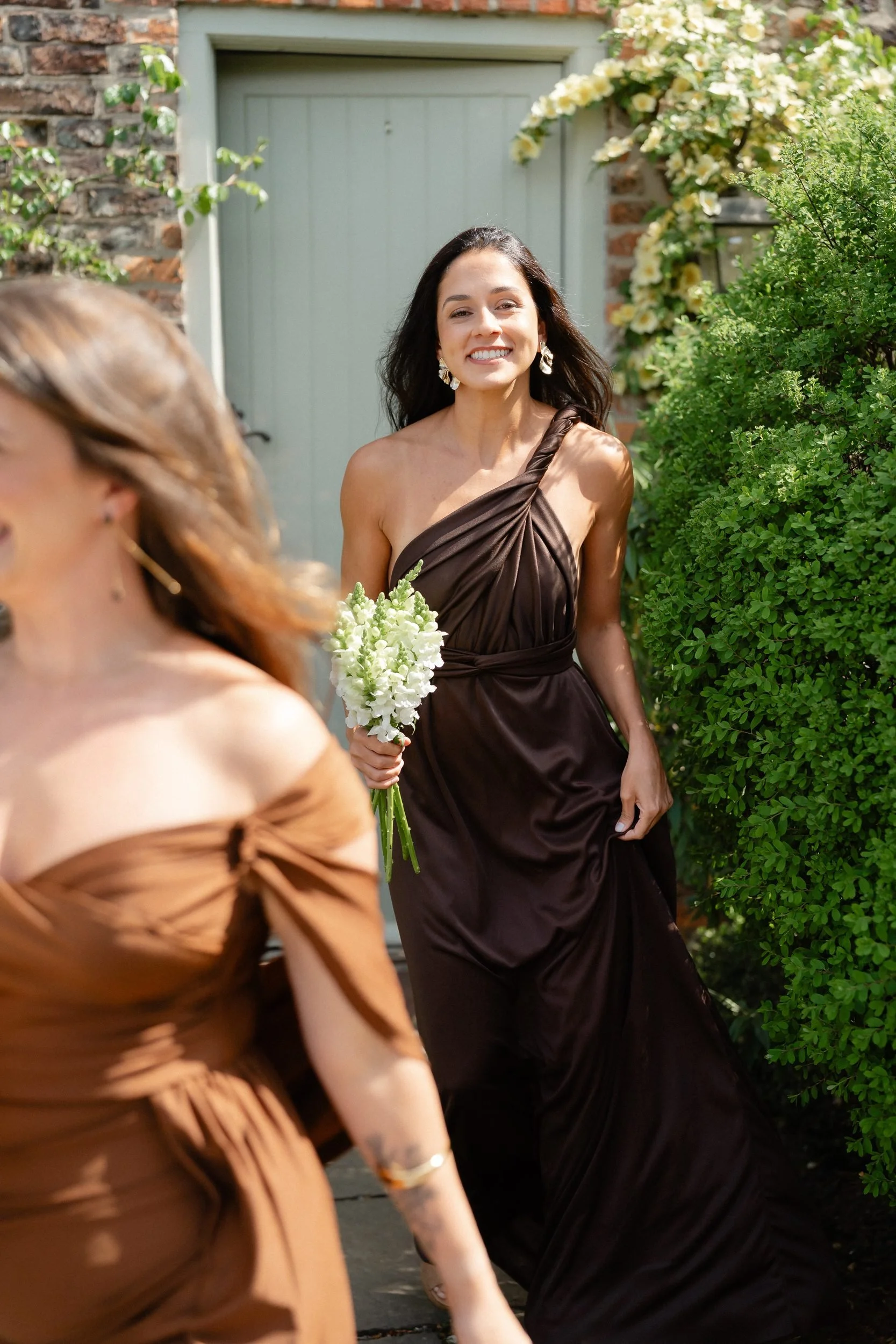 bridesmaids-walking-cottage-garden-path-240.jpg
