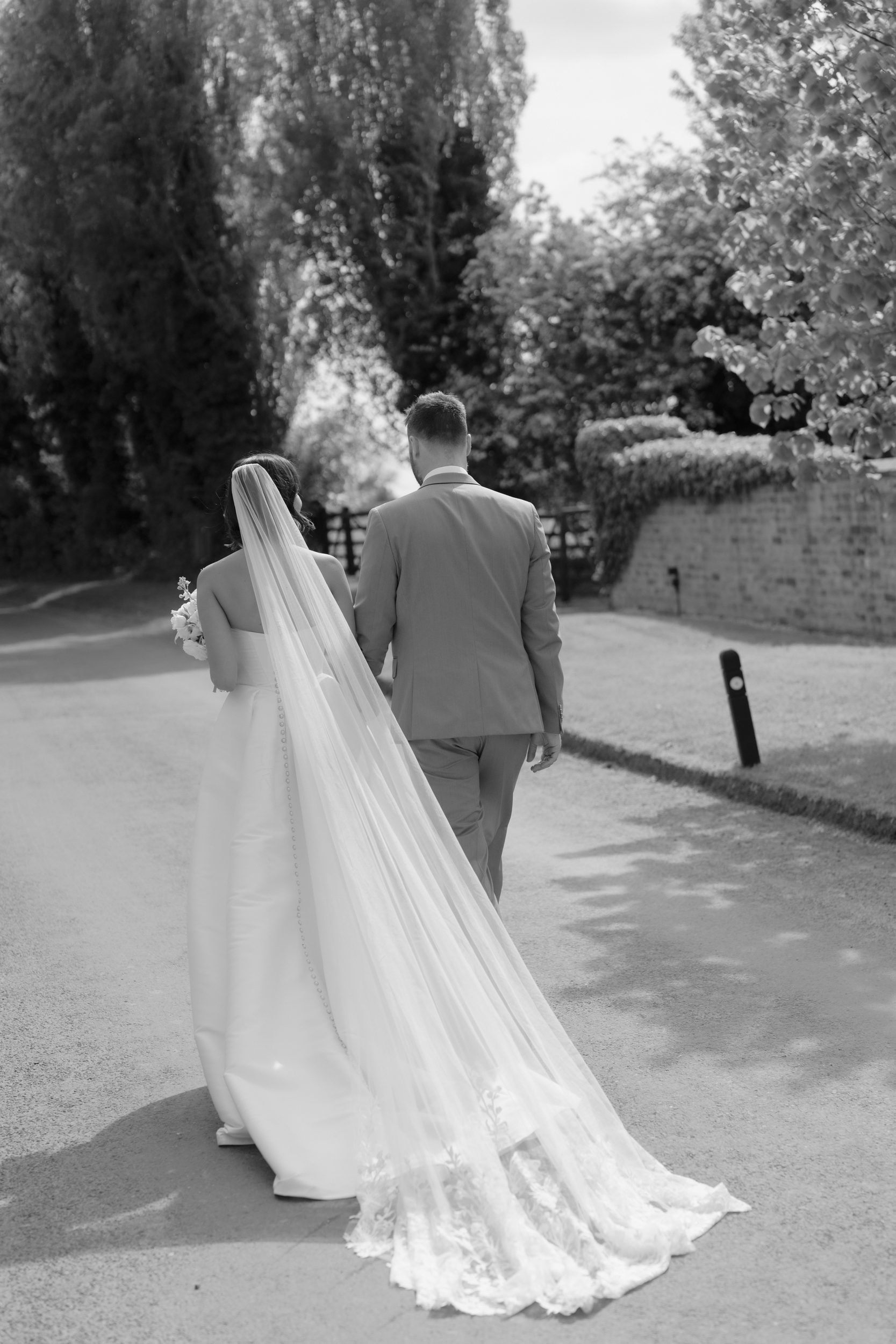 couple-walking-country-lane-black-and-white-509.jpg