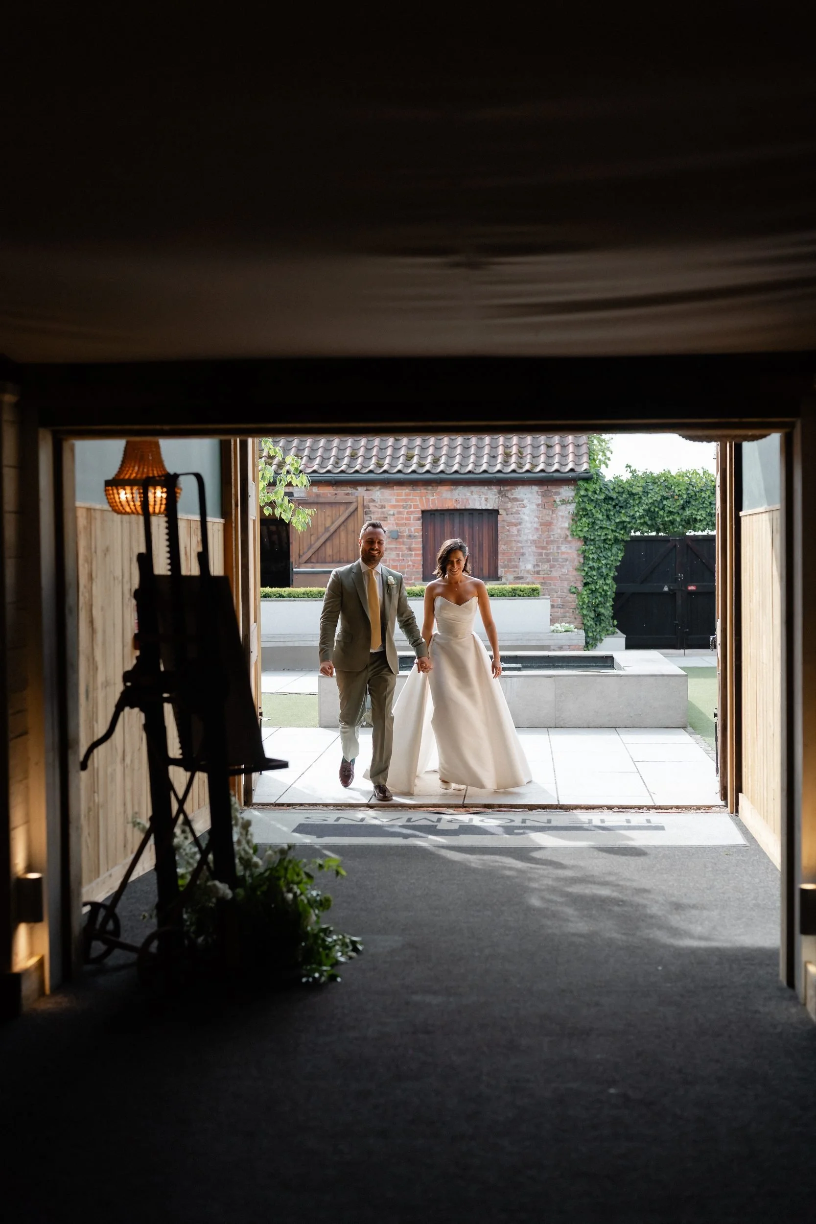 couple-walking-through-covered-walkway-courtyard-727.jpg