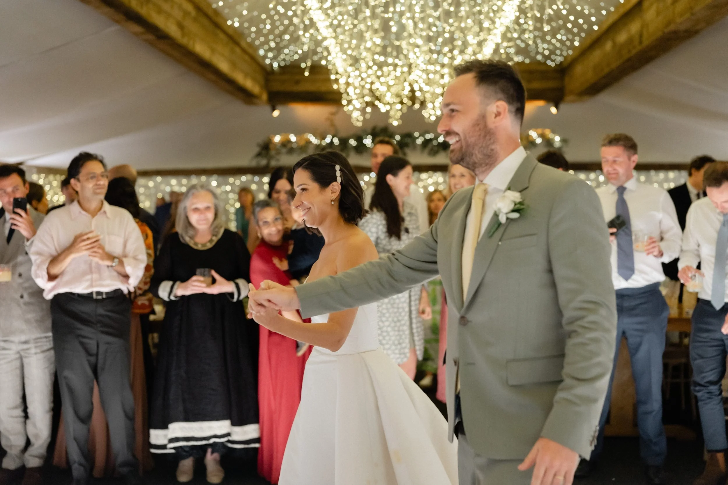 first-dance-guests-watching-fairy-light-ceiling-848.jpg