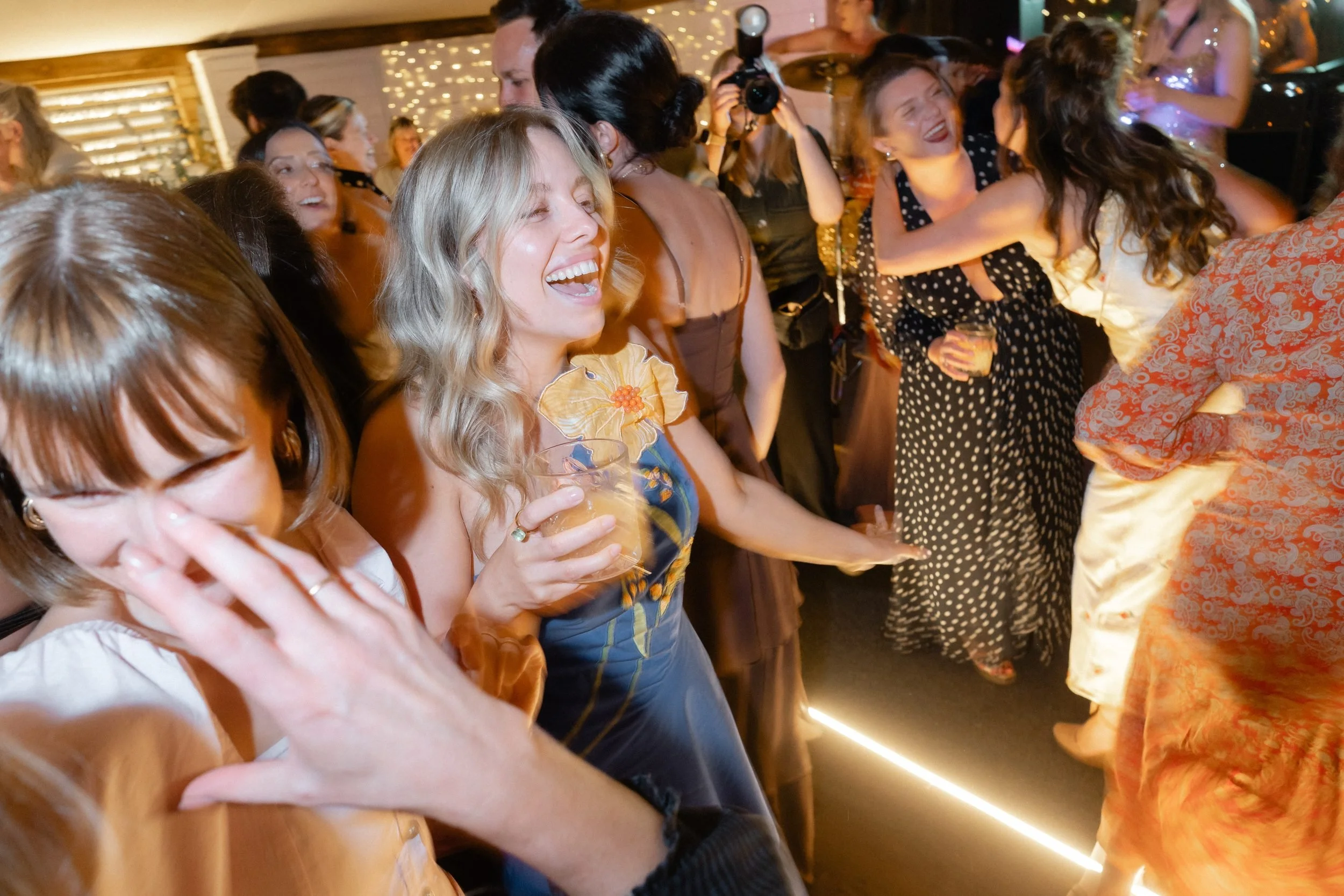 guests-dancing-evening-party-barn-wedding-893.jpg