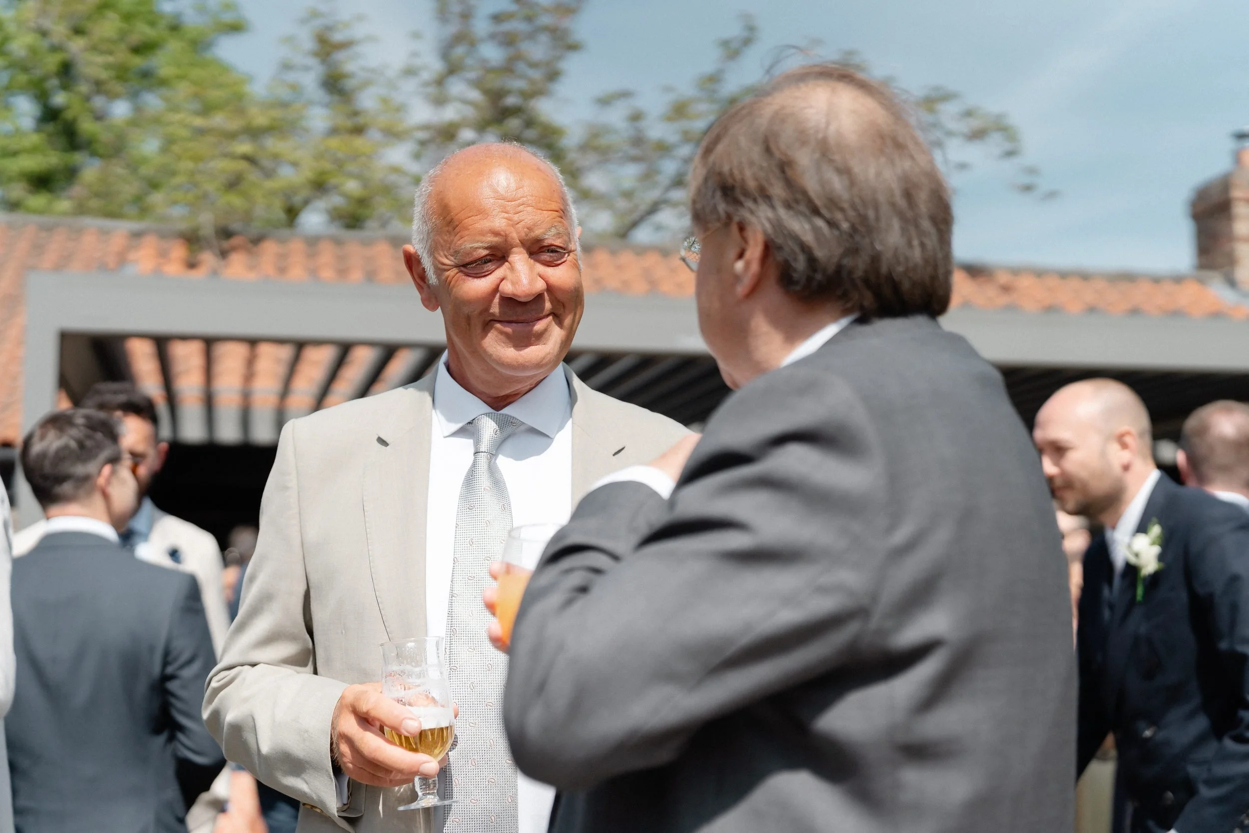 guests-drinks-reception-sunshine-yorkshire-barn-wedding-199.jpg
