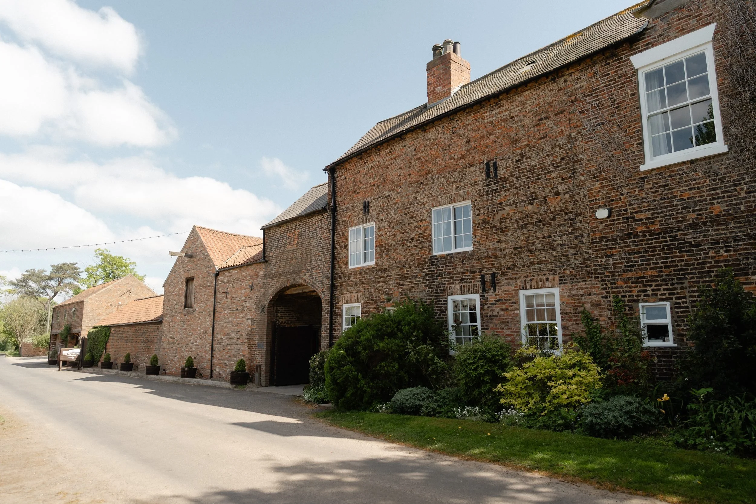 normans-farm-brick-farmhouse-courtyard-arch-york-34.jpg