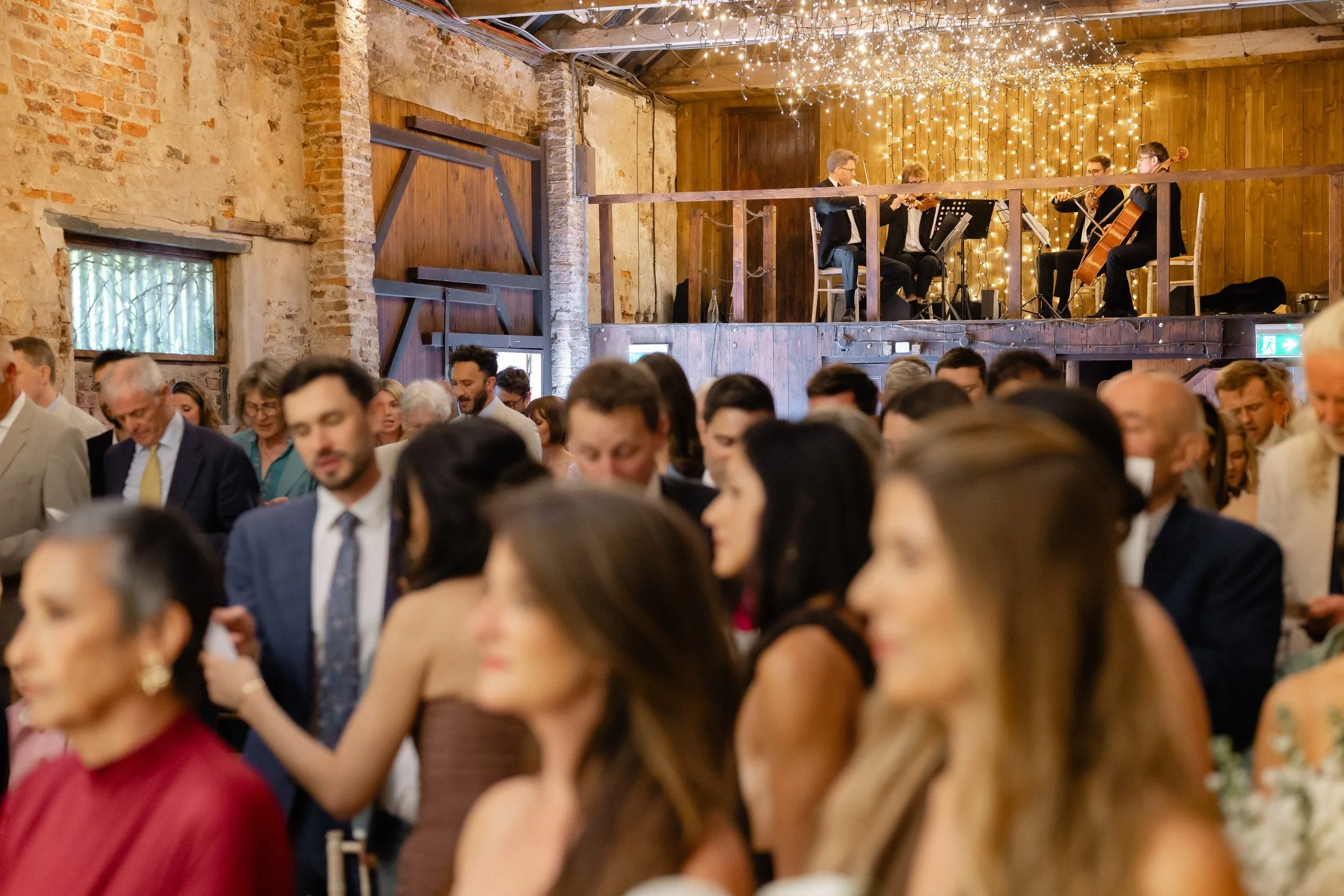 wedding-guests-barn-ceremony-string-quartet-mezzanine-311.jpg