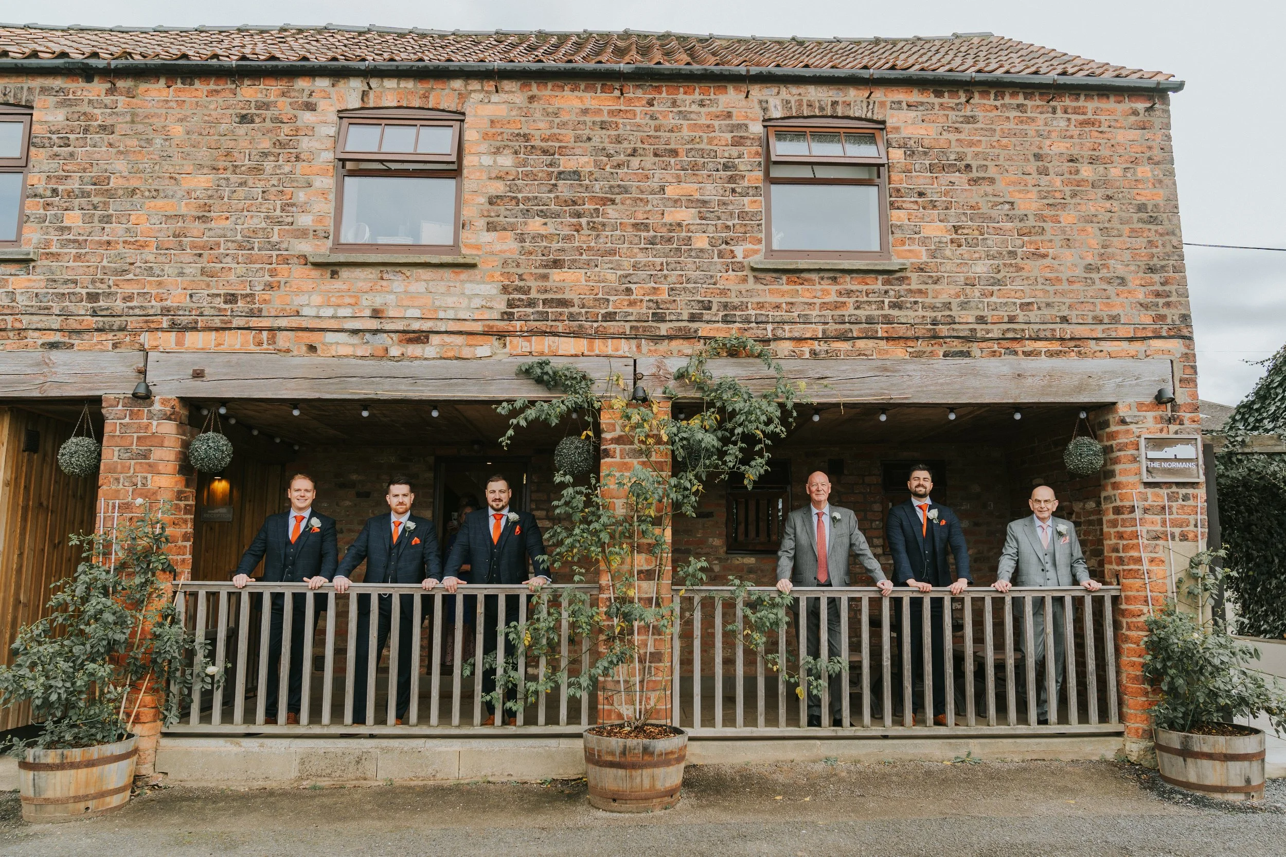 Groom and groomsmen outside The Granary. dotandscolly.co.uk