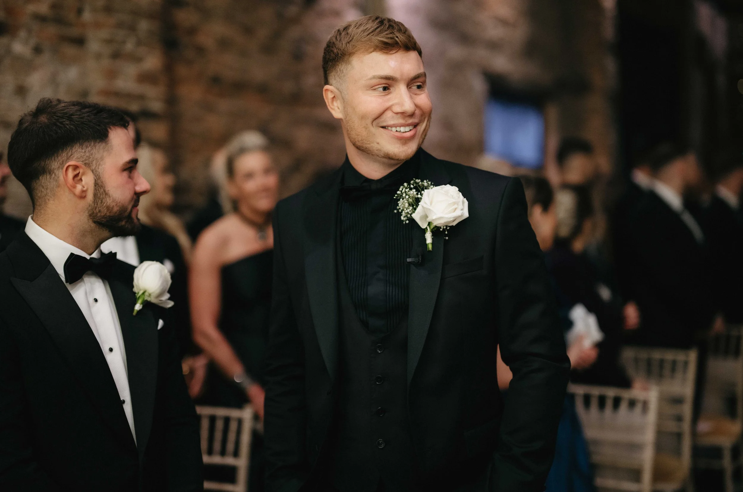 Groom in Normans Ceremony Barn. Photo by Razor Blade Weddings