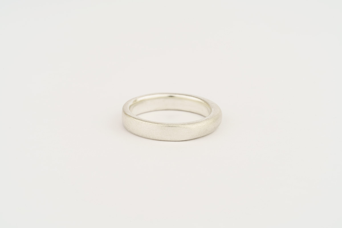  Gents' silver wedding band - half flat half round section - frosted finish 