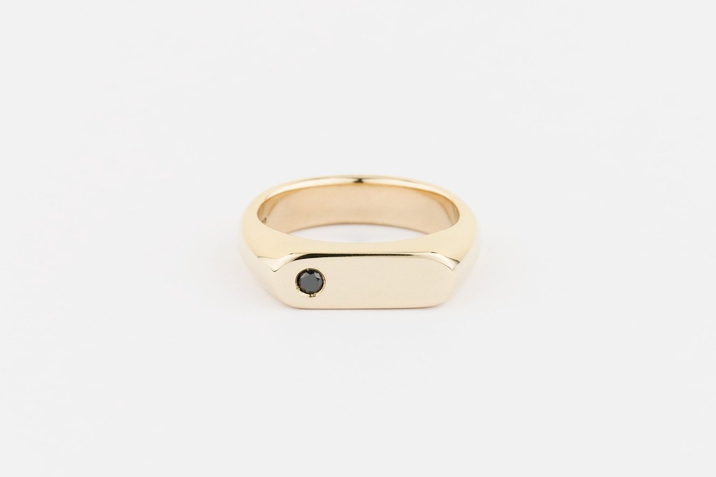  Recycled 9ct yellow gold pill signet ring set with a black diamond 