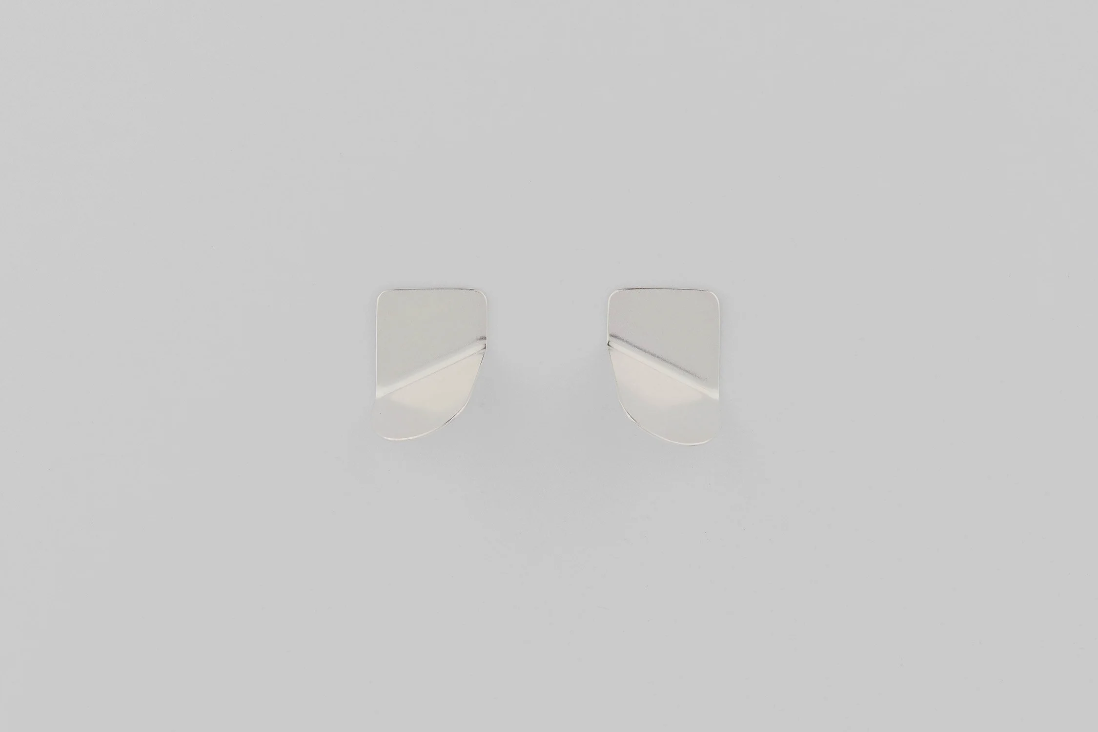 cecilia-stamp-Tab-Earrings-Silver-Photo-GabrielaSilveira.jpg