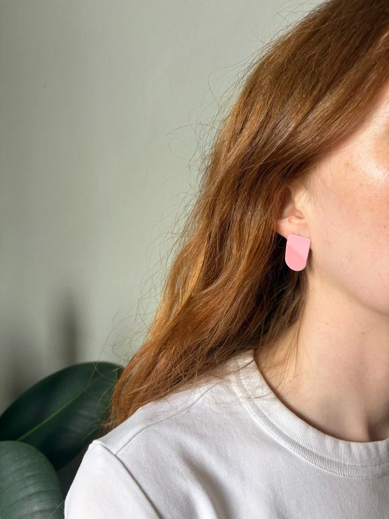 tab-earrings-model-pink.jpg