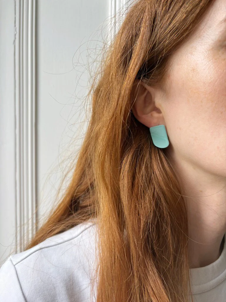 tab-earrings-model-blue.jpg