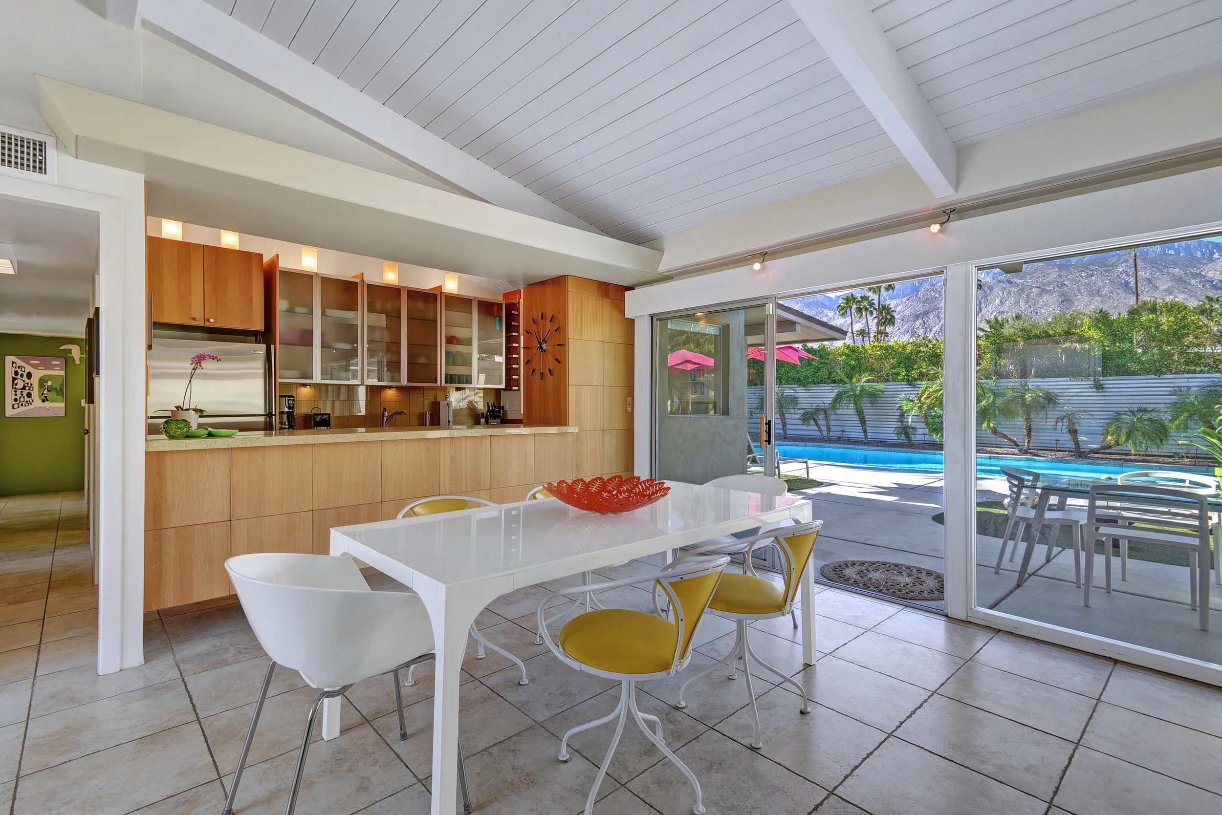 WEBSITE DINING ROOM TO KITCHEN AND POOL.jpg