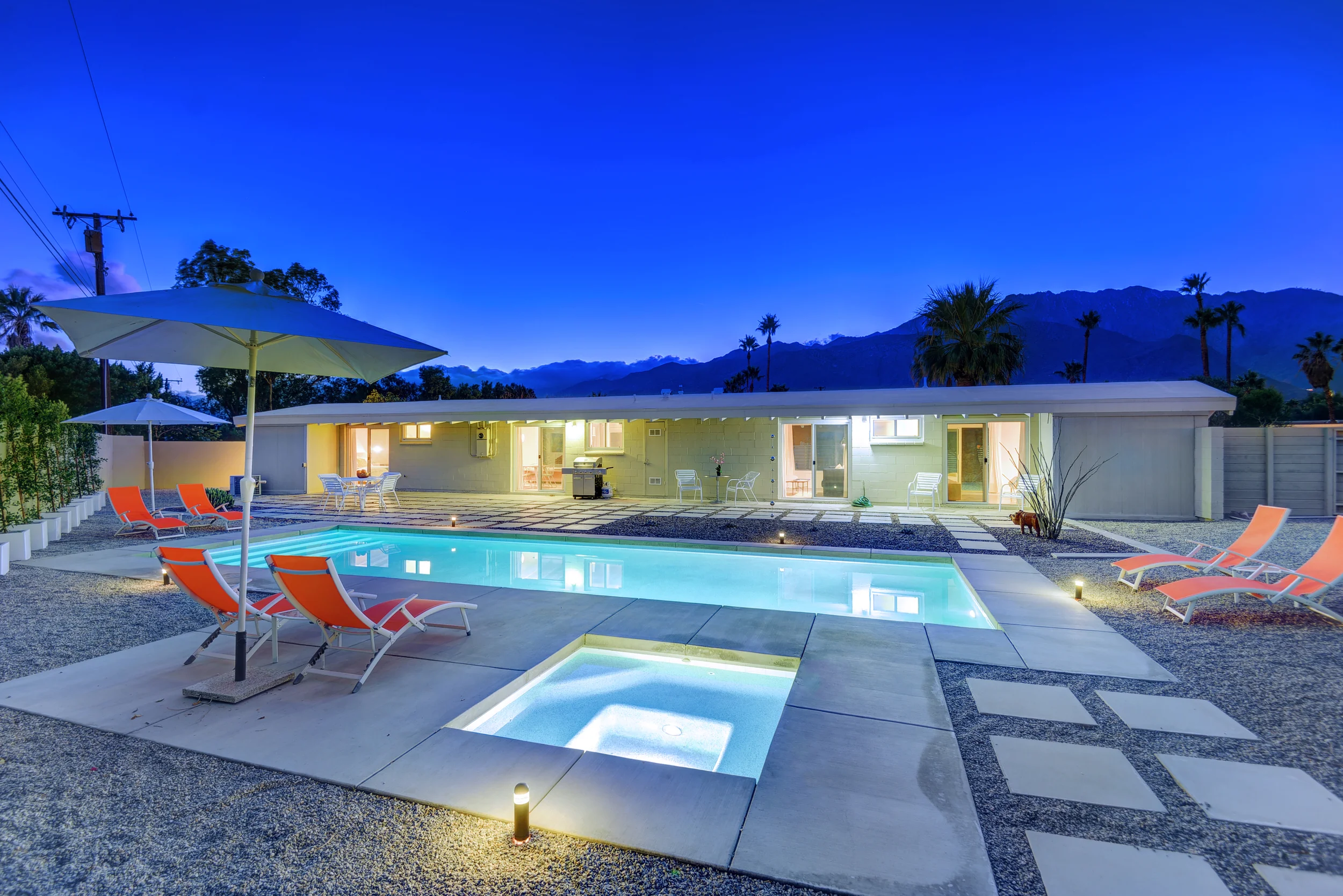 SPA AND POOL OVER HOUSE TO MOUNTAINS NIGHT.jpg