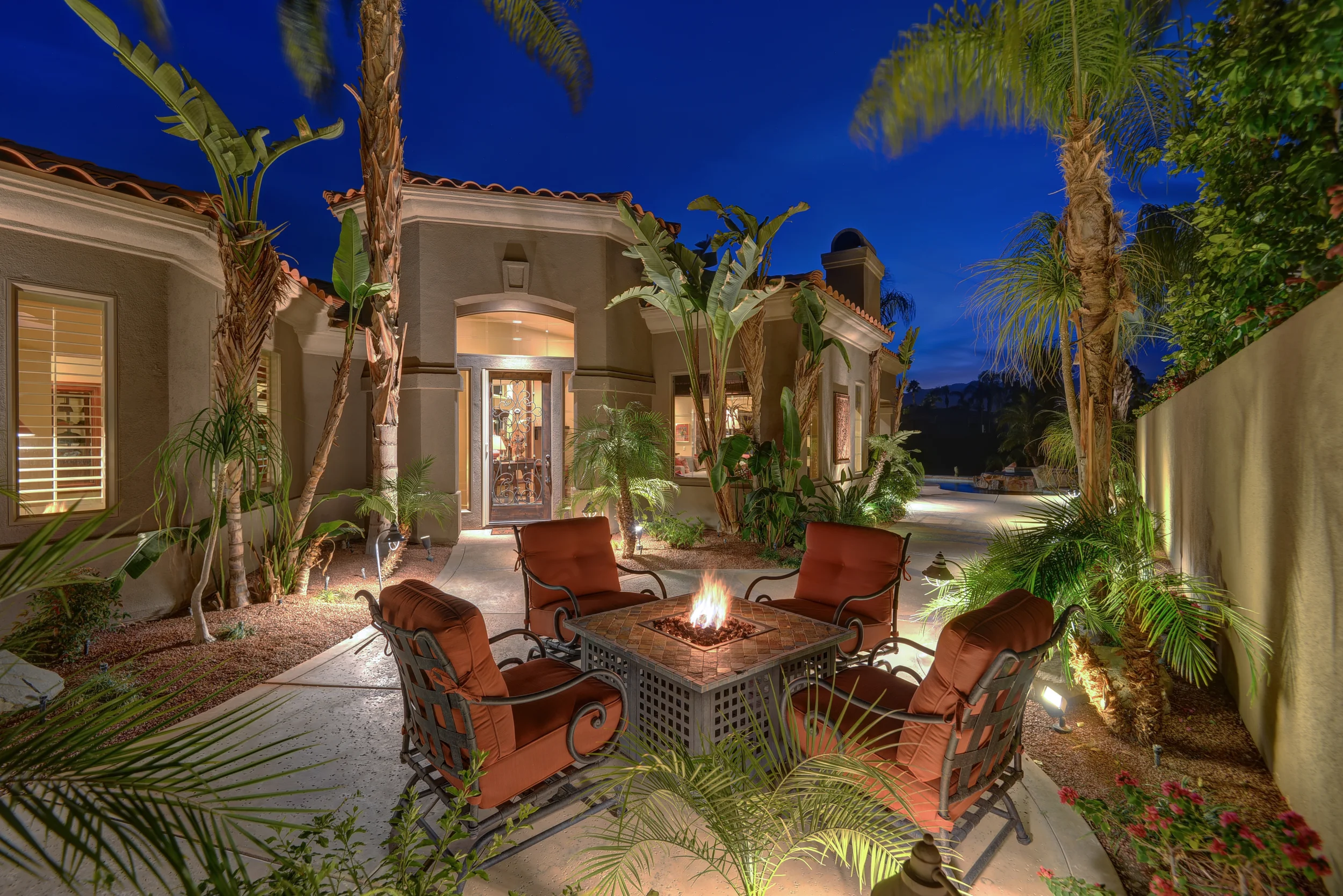 FRONT ENTRY COURTYARD WITH FIREPIT NIGHT.jpg
