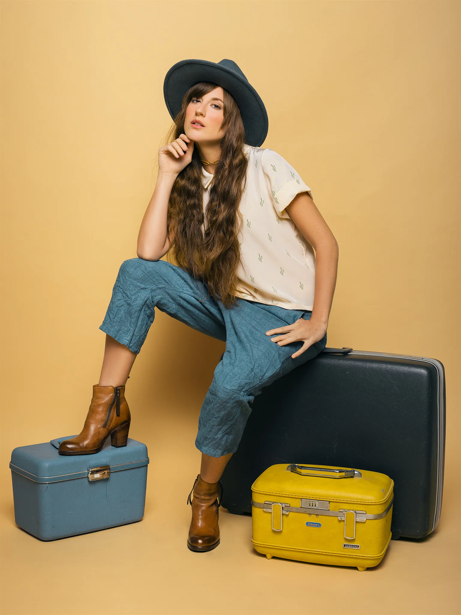Model: Rossi Saenz Clothing & Boots: Shop Bird Boutique Hat: Southern Hippie Vintage Luggage: Revival Vintage