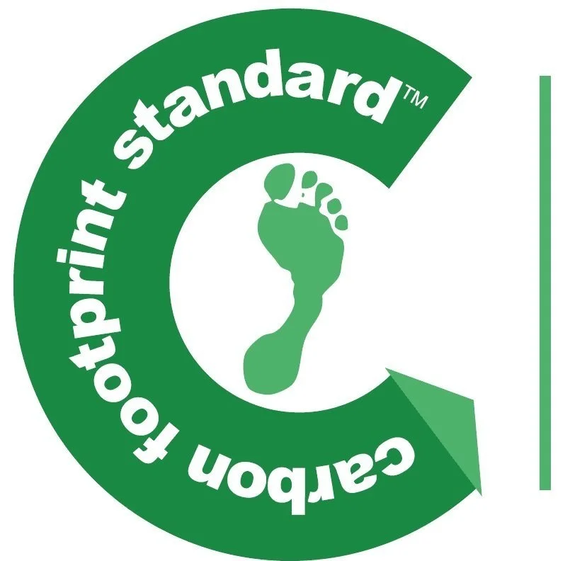Green circular logo with a white outline of a footprint in the center. The text around the circle reads "C-CAREPOINTTM to promote standard."