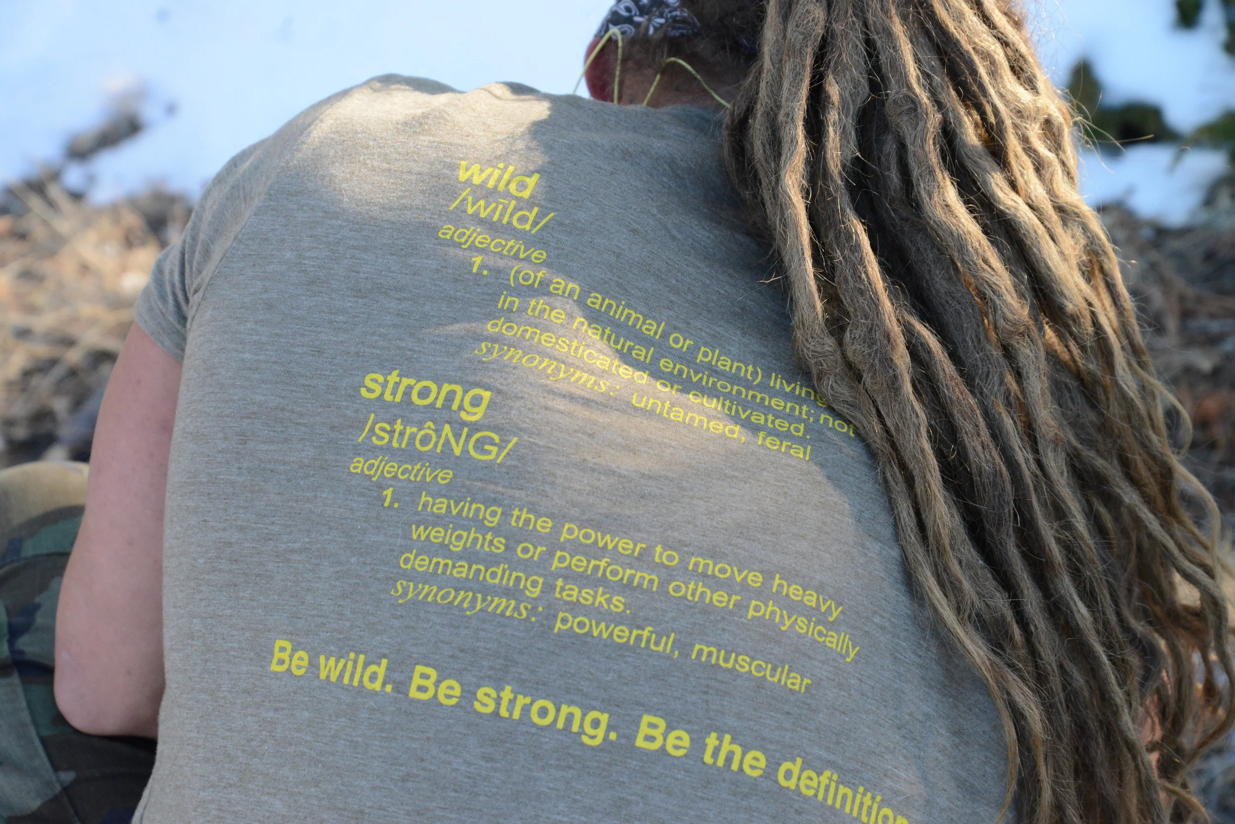 "(of an animal or plant) living in the natural environment: not domesticated or cultivated. Synonyms : untamed, feral."