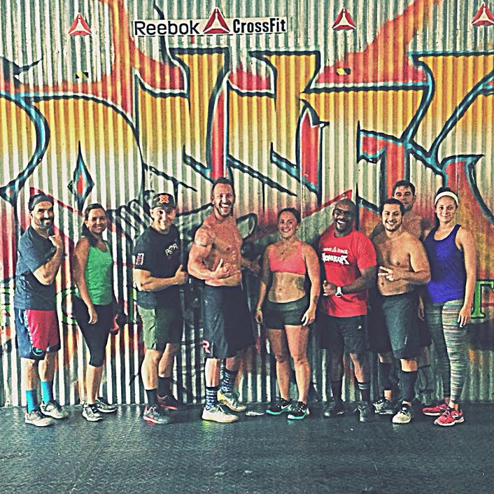 Founder, center, after logging for 100 days. Reebok Crossfit Ironheart, San Juan, Puerto Rico.