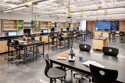 Rapidly reconfigurable furnishings allow students and instructors to move seamlessly from large group discussions to small group lab activities.