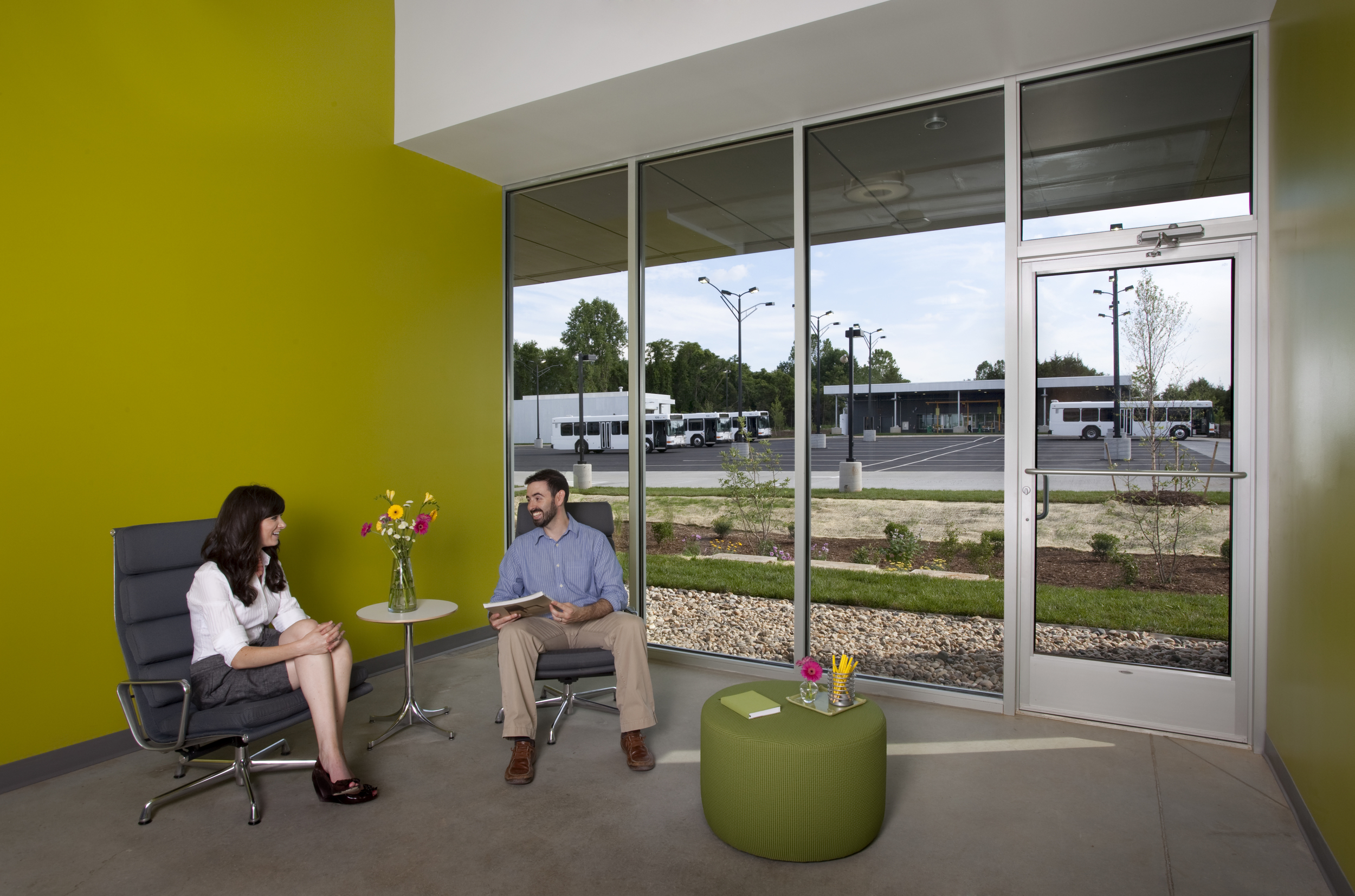 From the staff lounge, employees enjoy simultaneous views of the butterfly garden and the transit vehicle parking area.